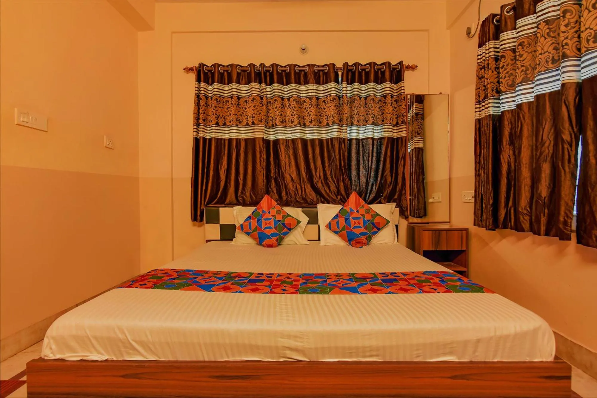 Bed in FabHotel Yatika Residency