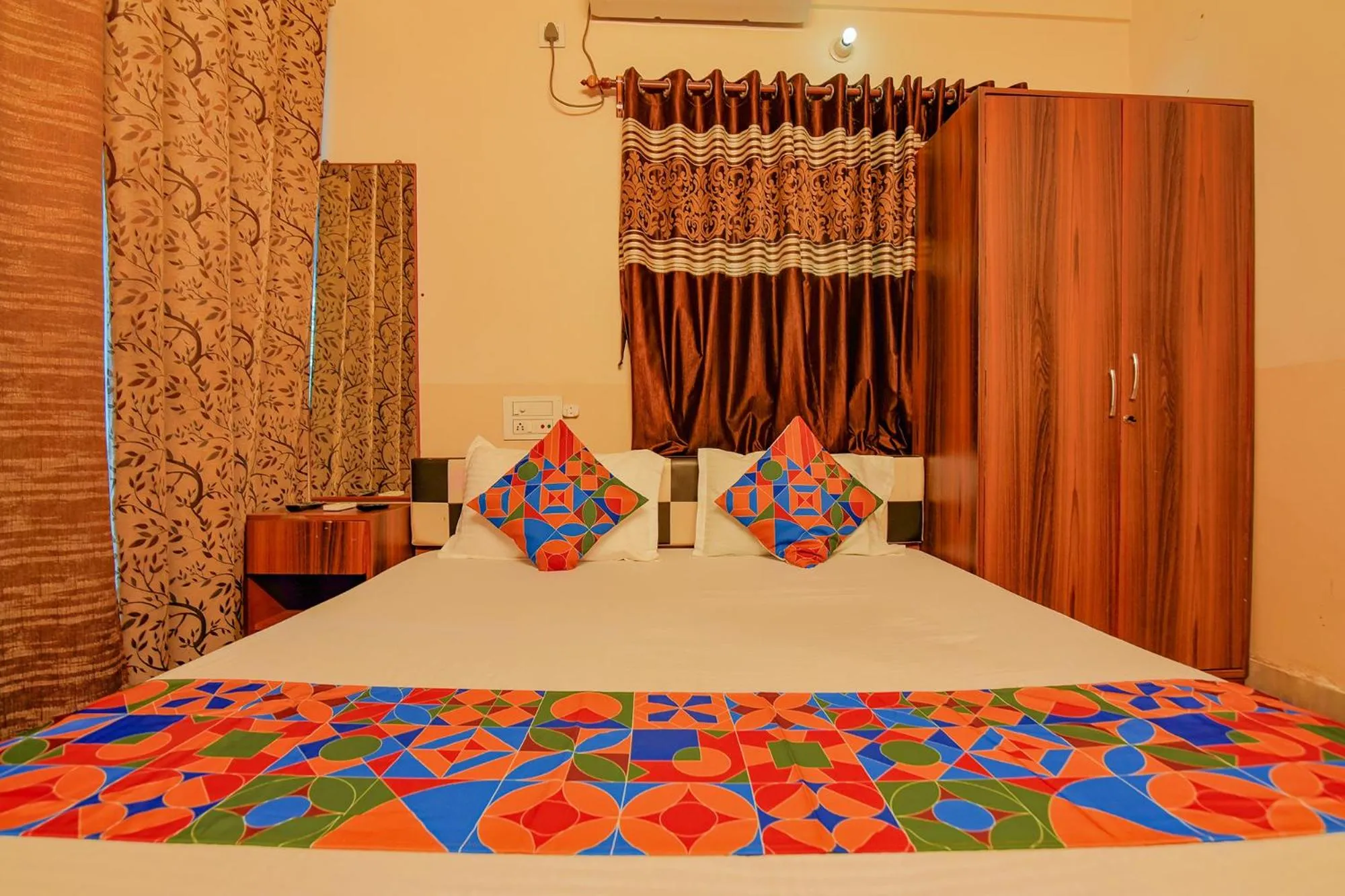 Bed in FabHotel Yatika Residency