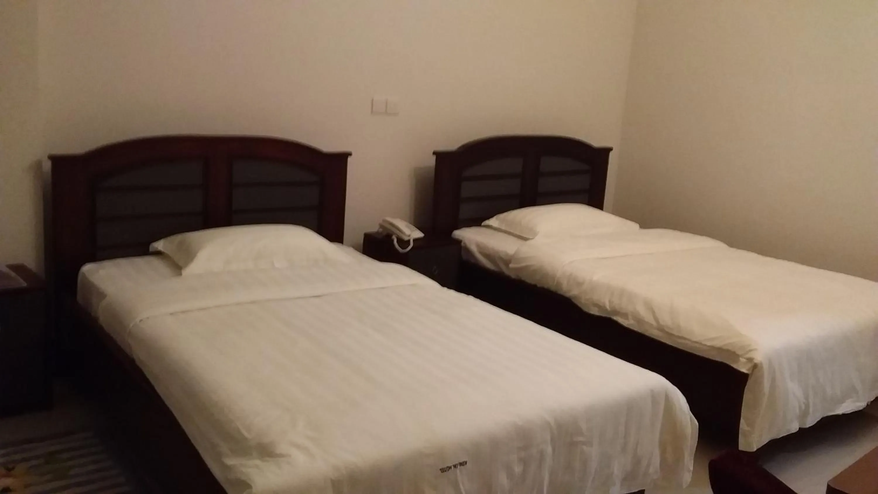 Bed in Kenlon Hotel Kampala