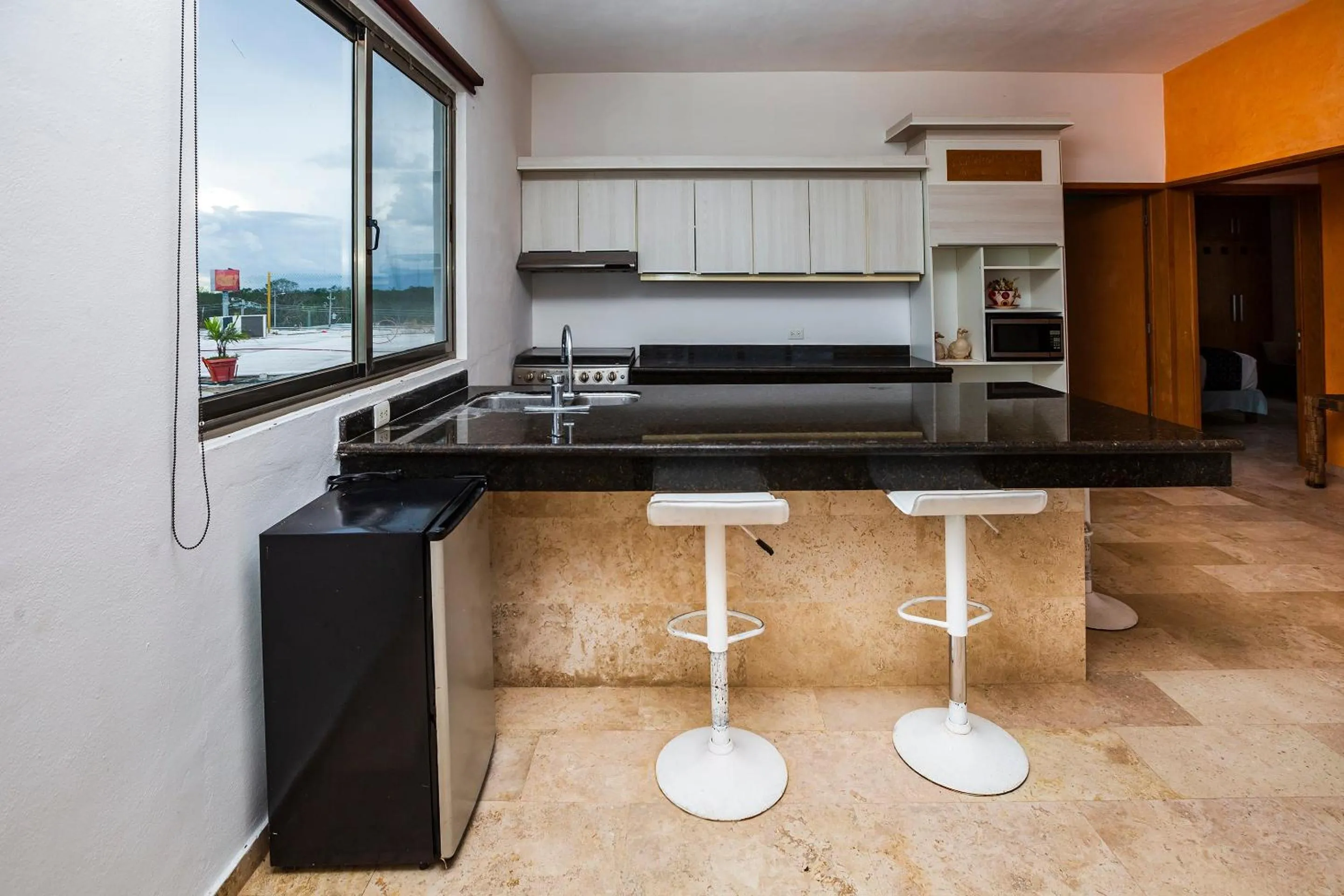 Bedroom in Capital O Cancun International Airport 24 7