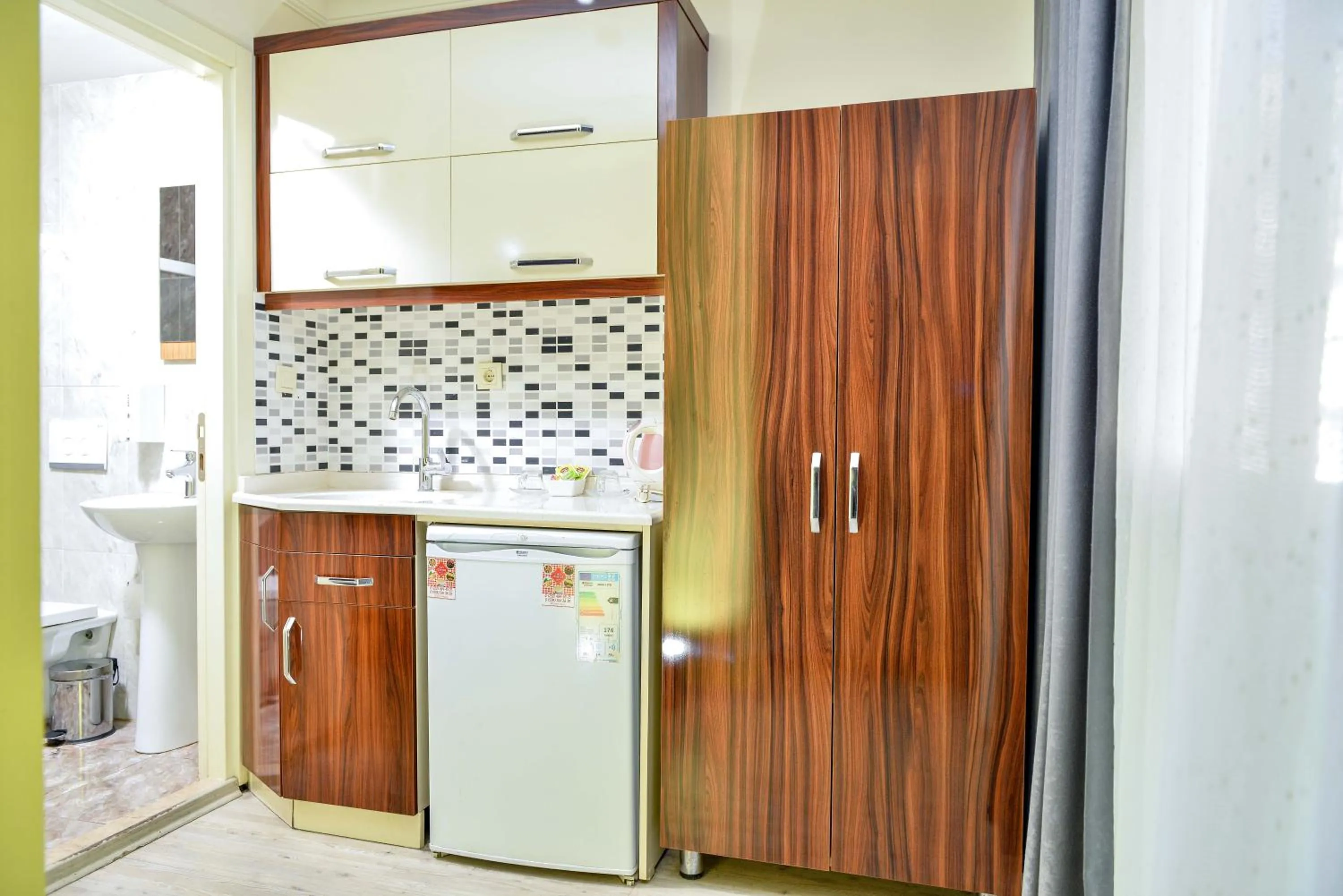 Kitchen or kitchenette in My Sun Hotel