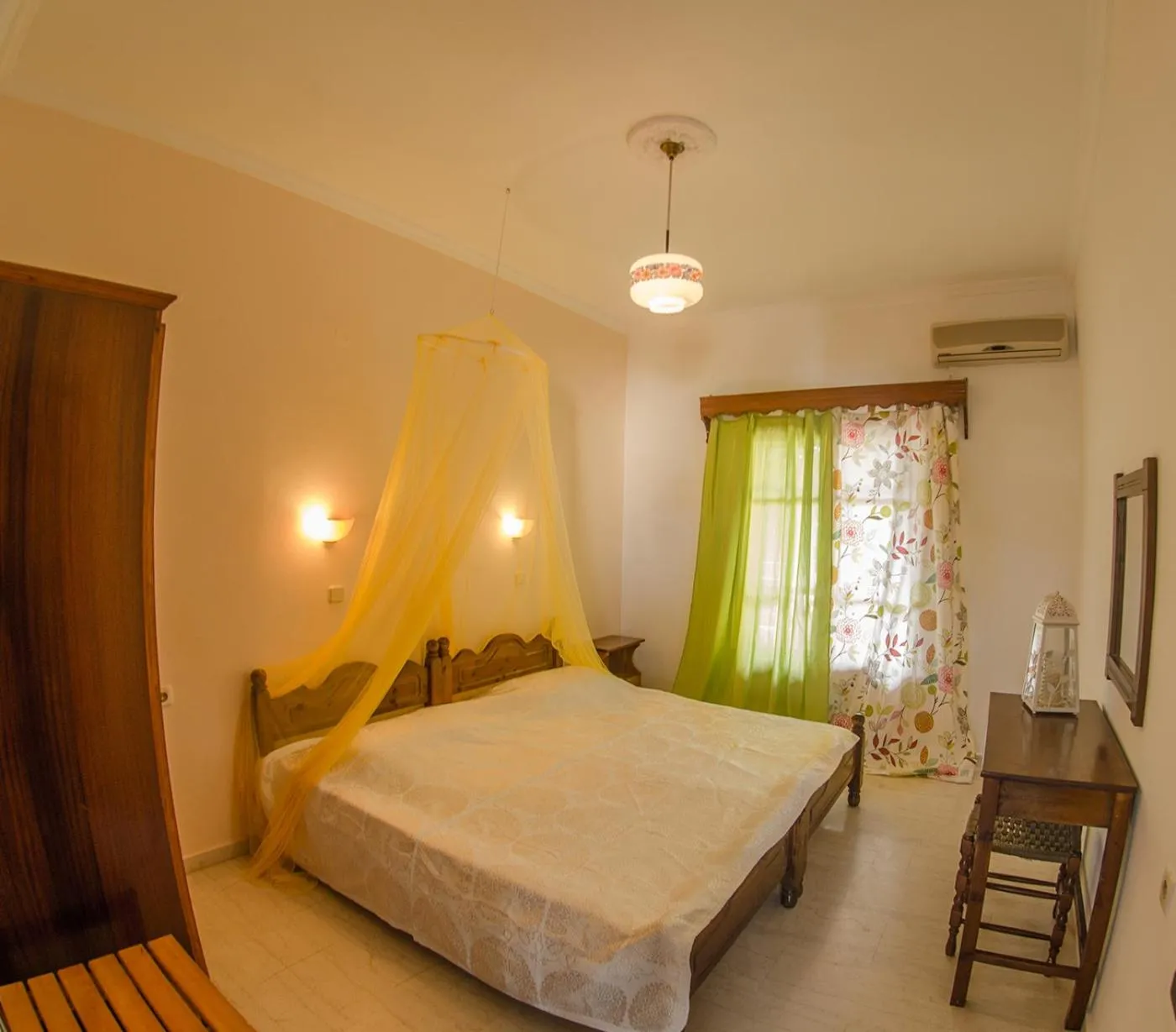 Bed in Takis Apartments