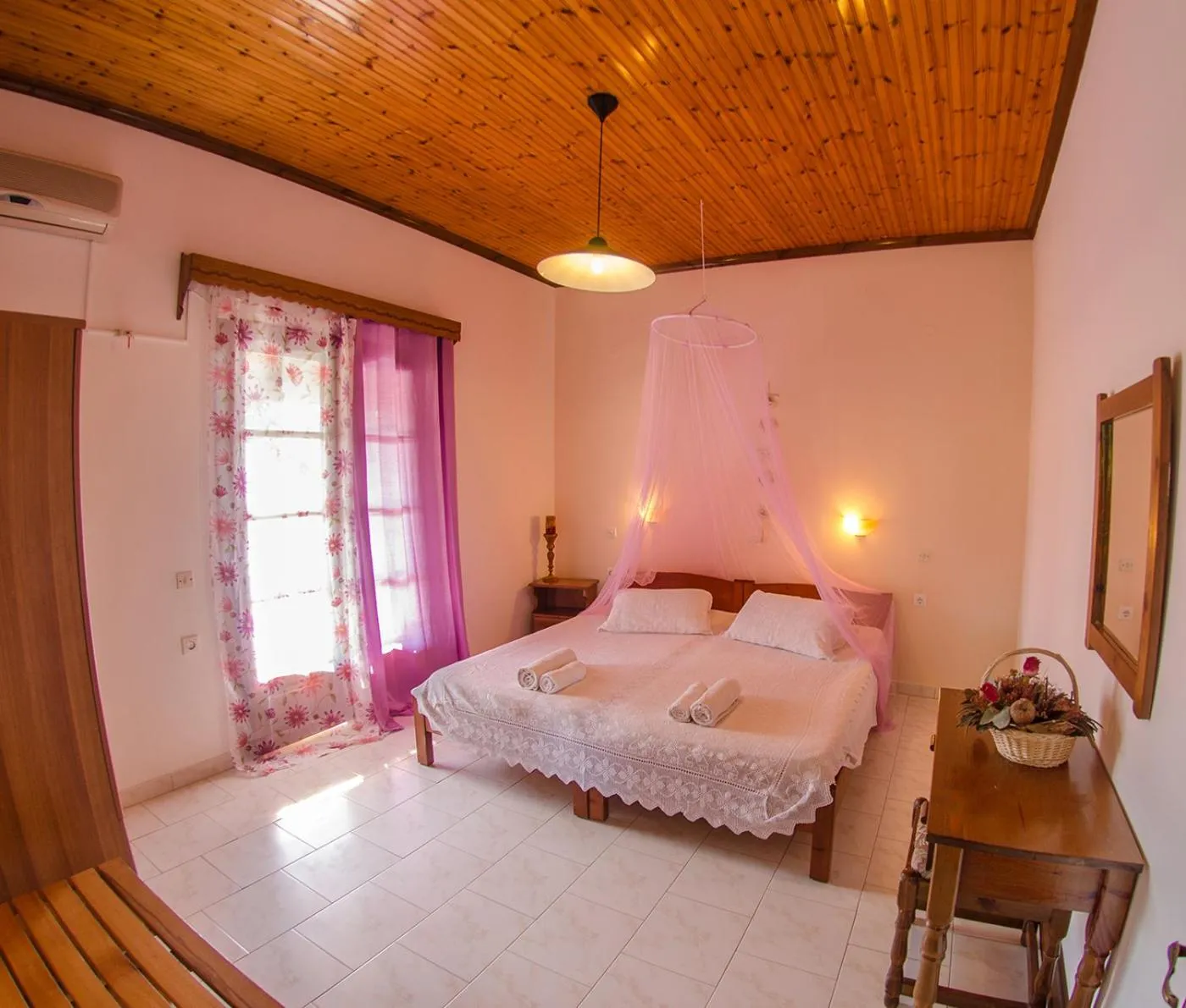 Bed in Takis Apartments