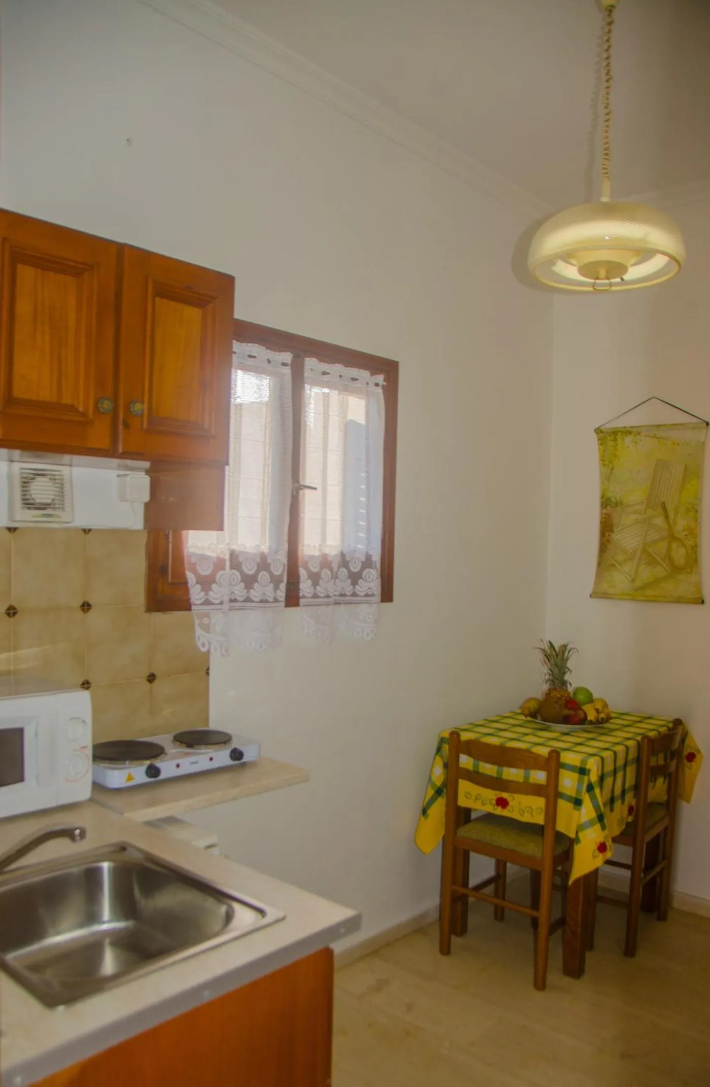 Kitchen or kitchenette in Takis Apartments