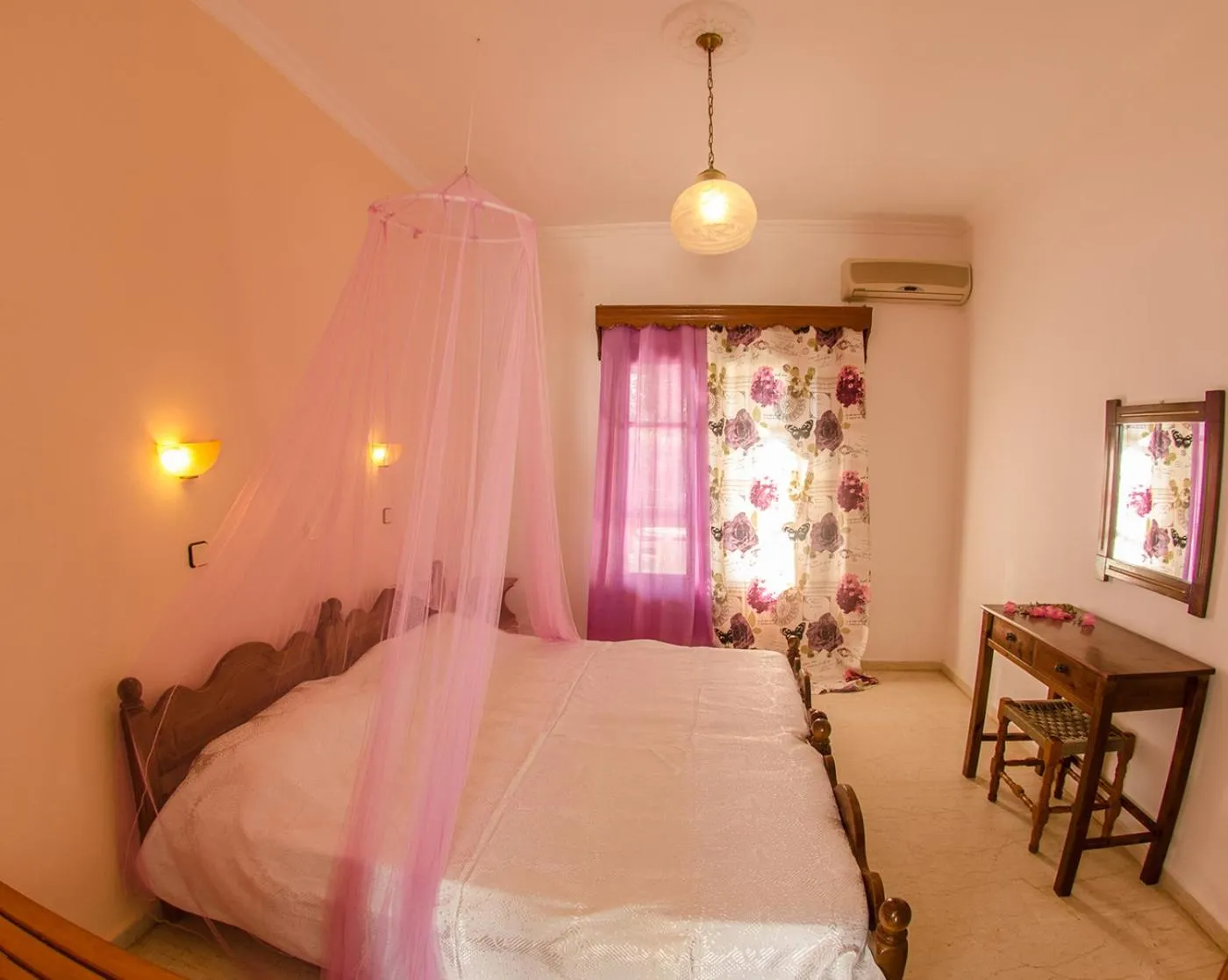 Bed in Takis Apartments