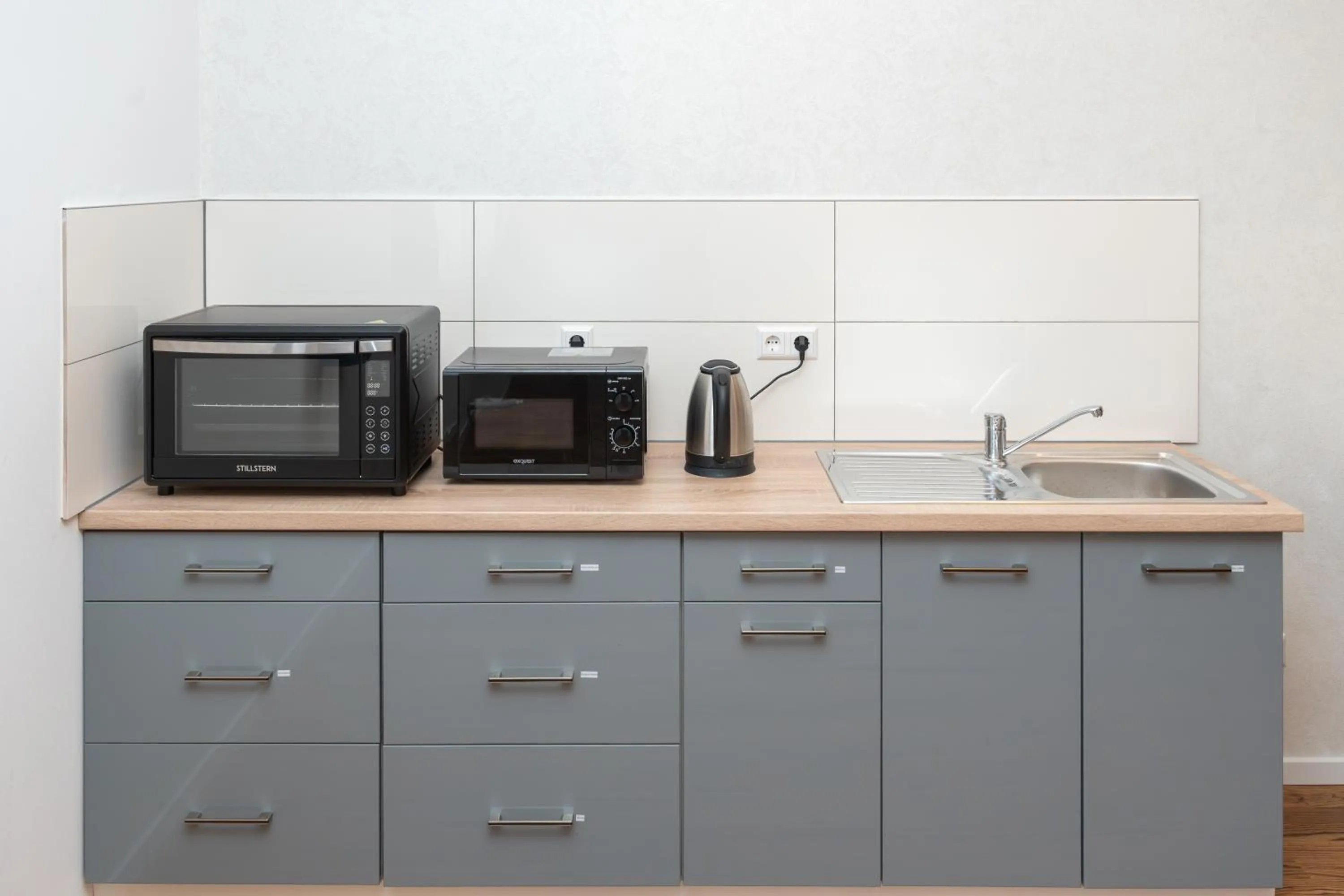 Communal lounge/ TV room in Hotel Phoenix