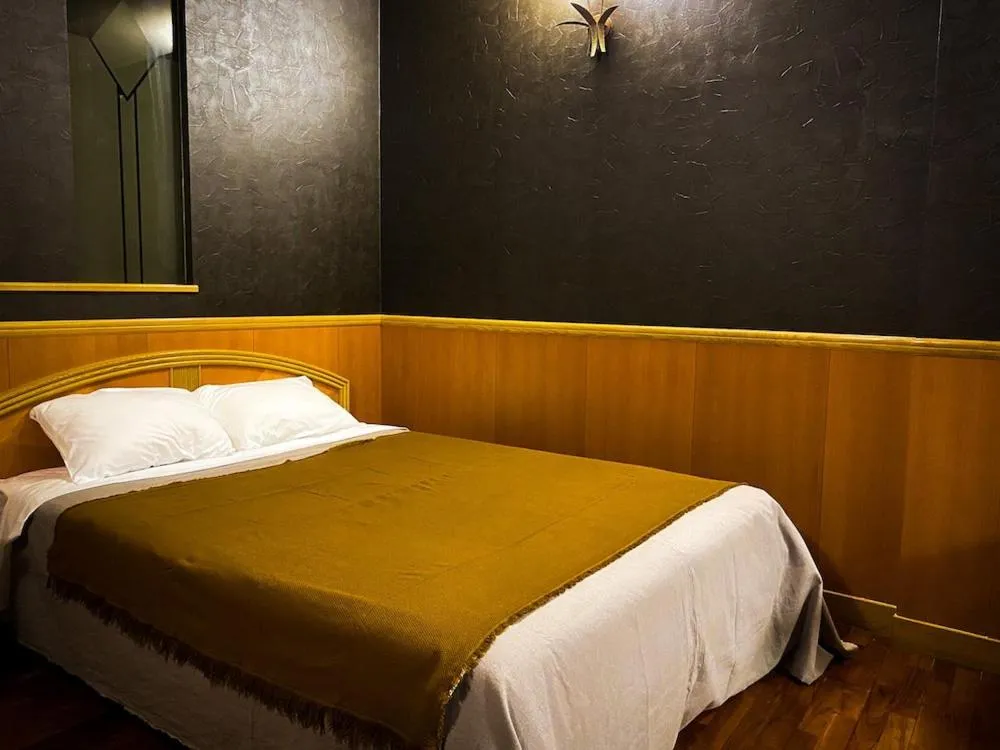 Photo of the whole room, Bed in Hotel bin