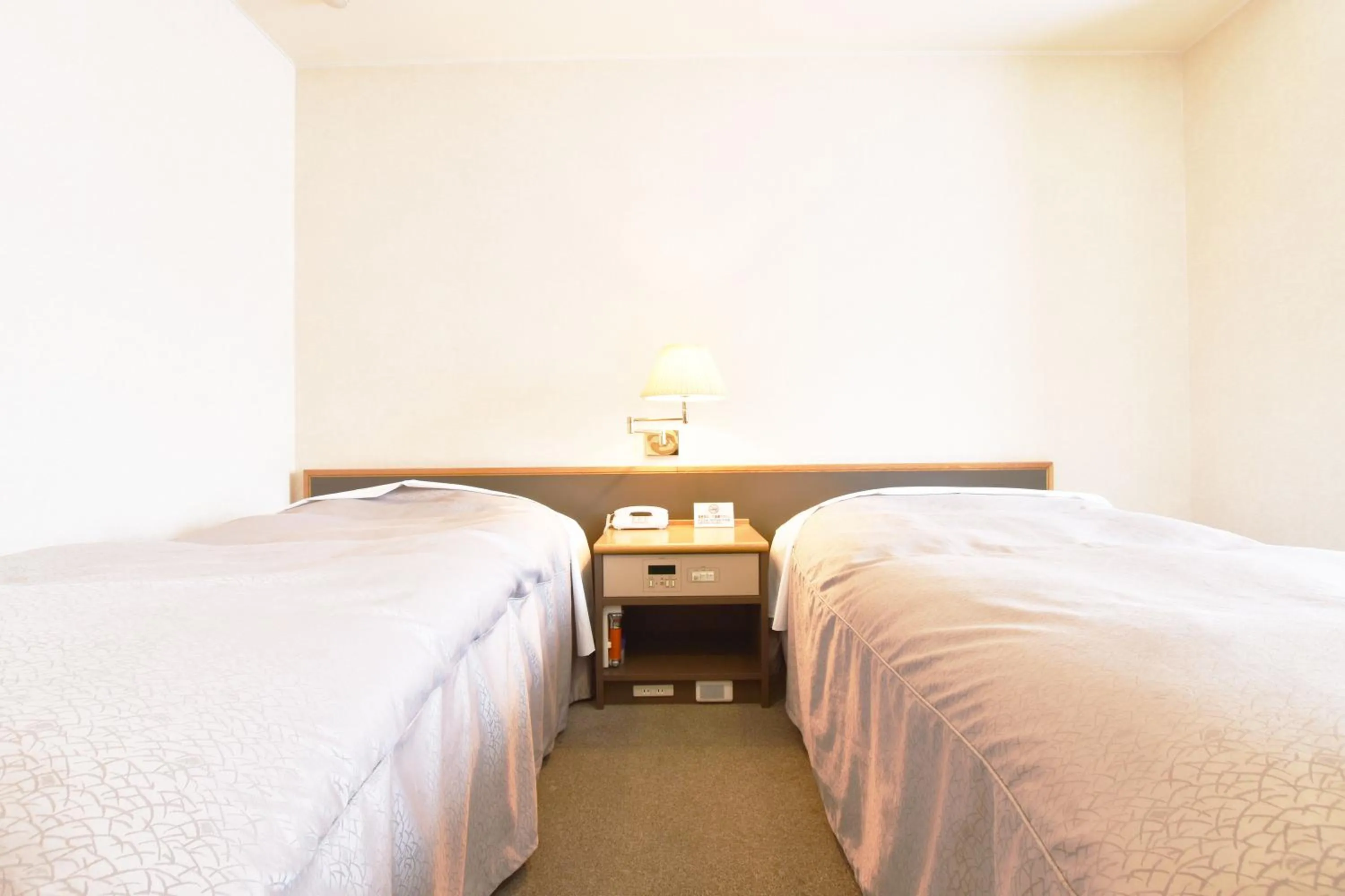 Bed in Nayoro Onsen Sunpillar