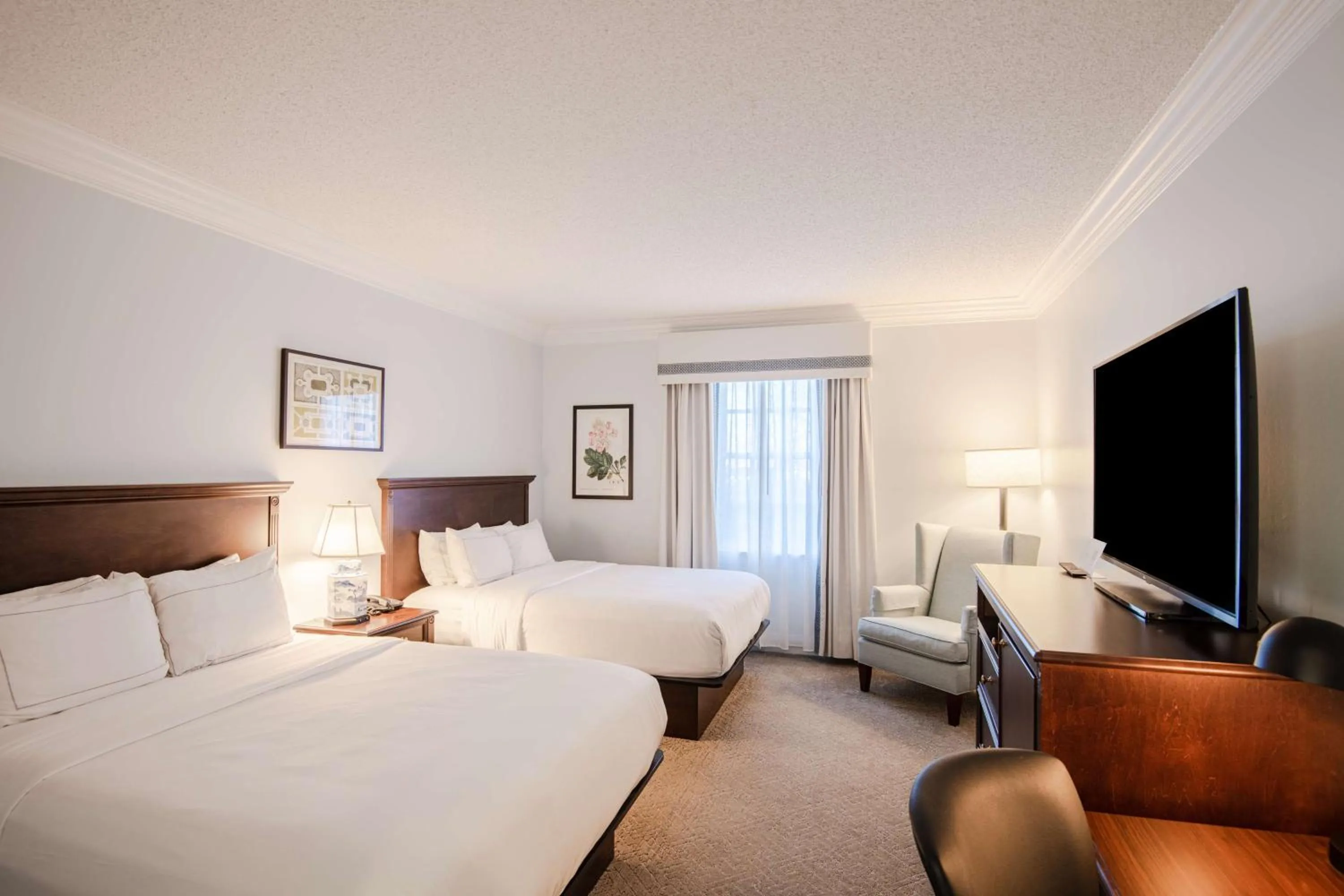 Bed in The Founders Inn & Spa Tapestry Collection By Hilton