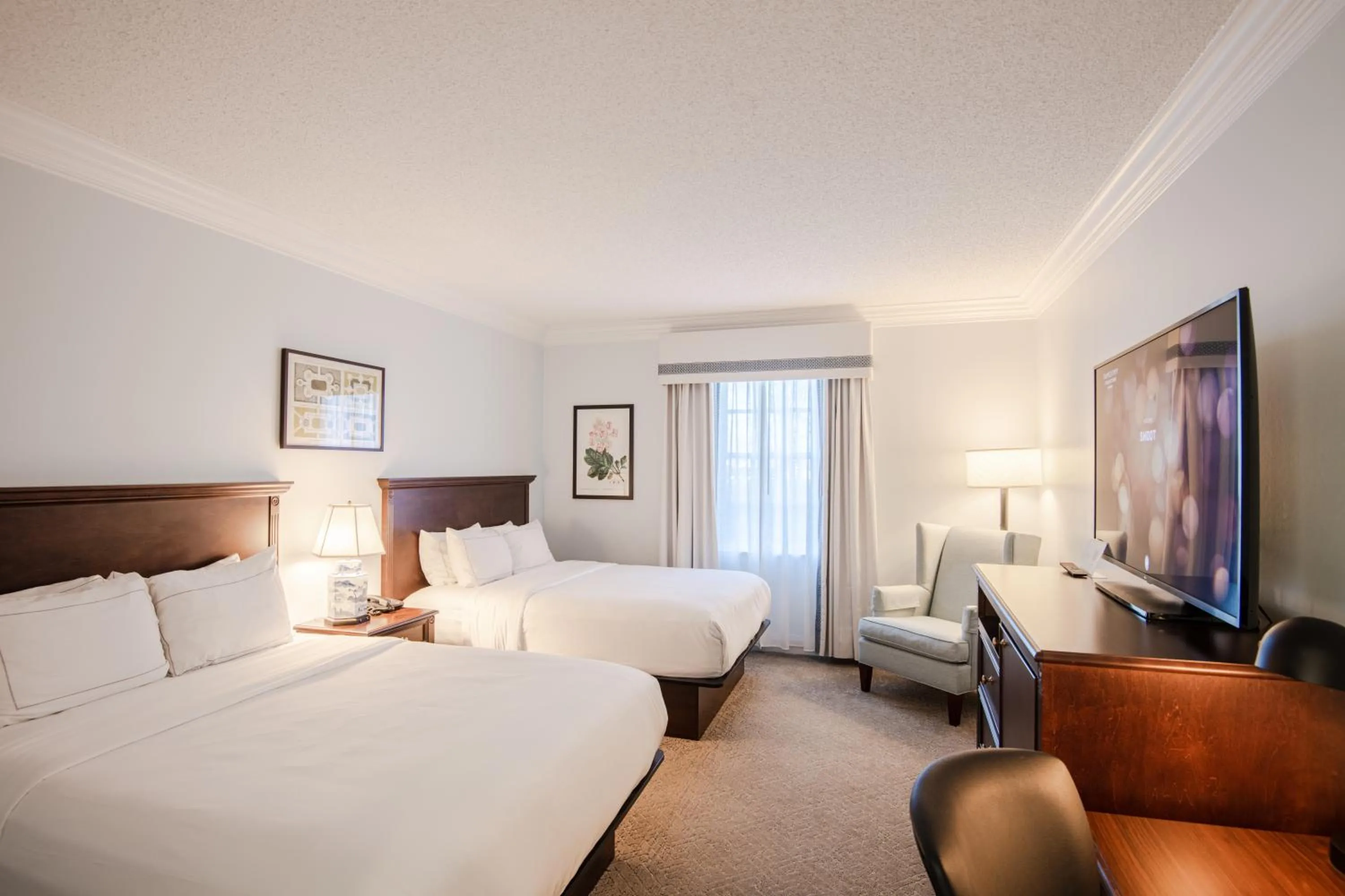 Bed in The Founders Inn & Spa Tapestry Collection By Hilton