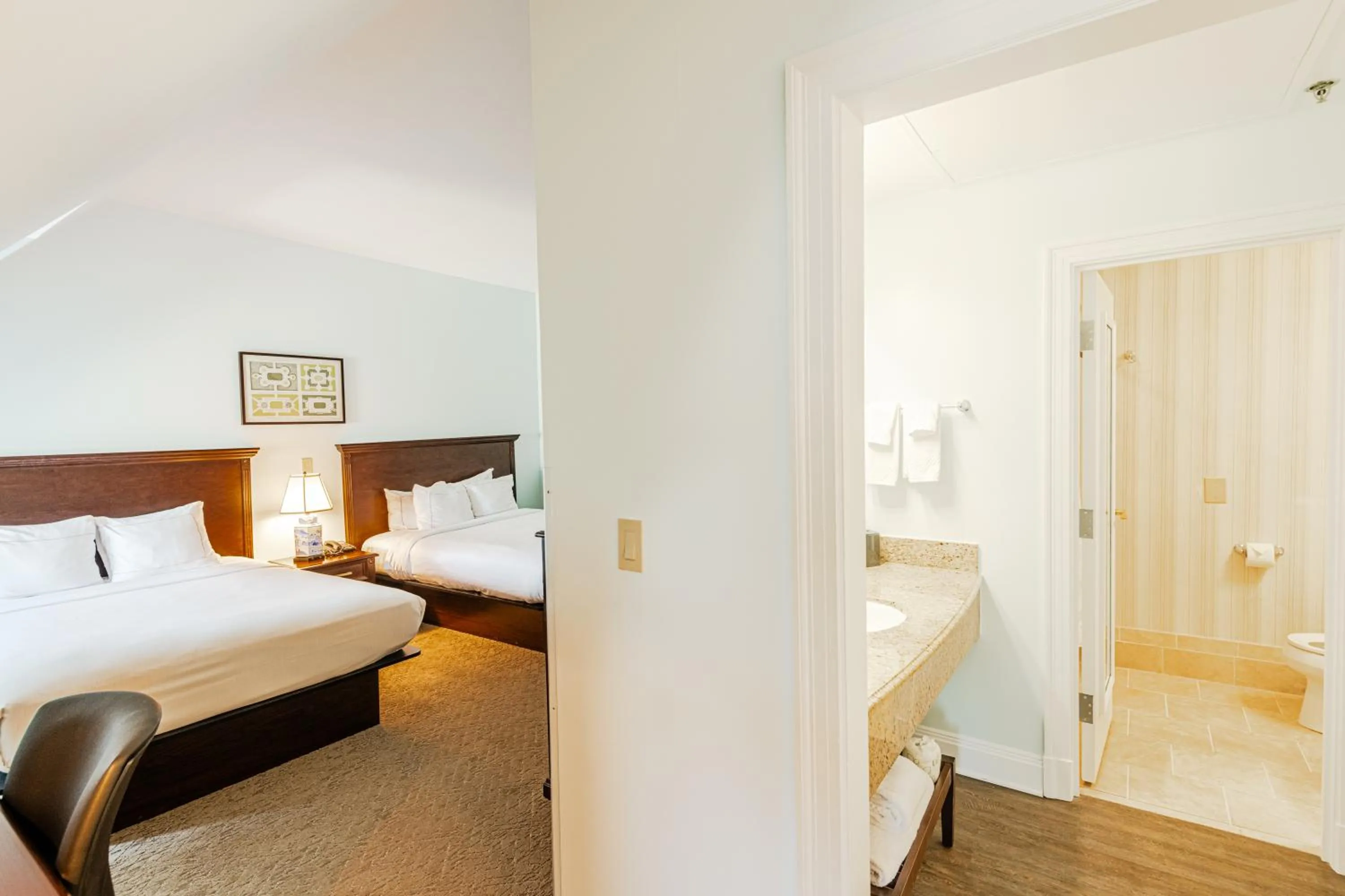 Bed in The Founders Inn & Spa Tapestry Collection By Hilton