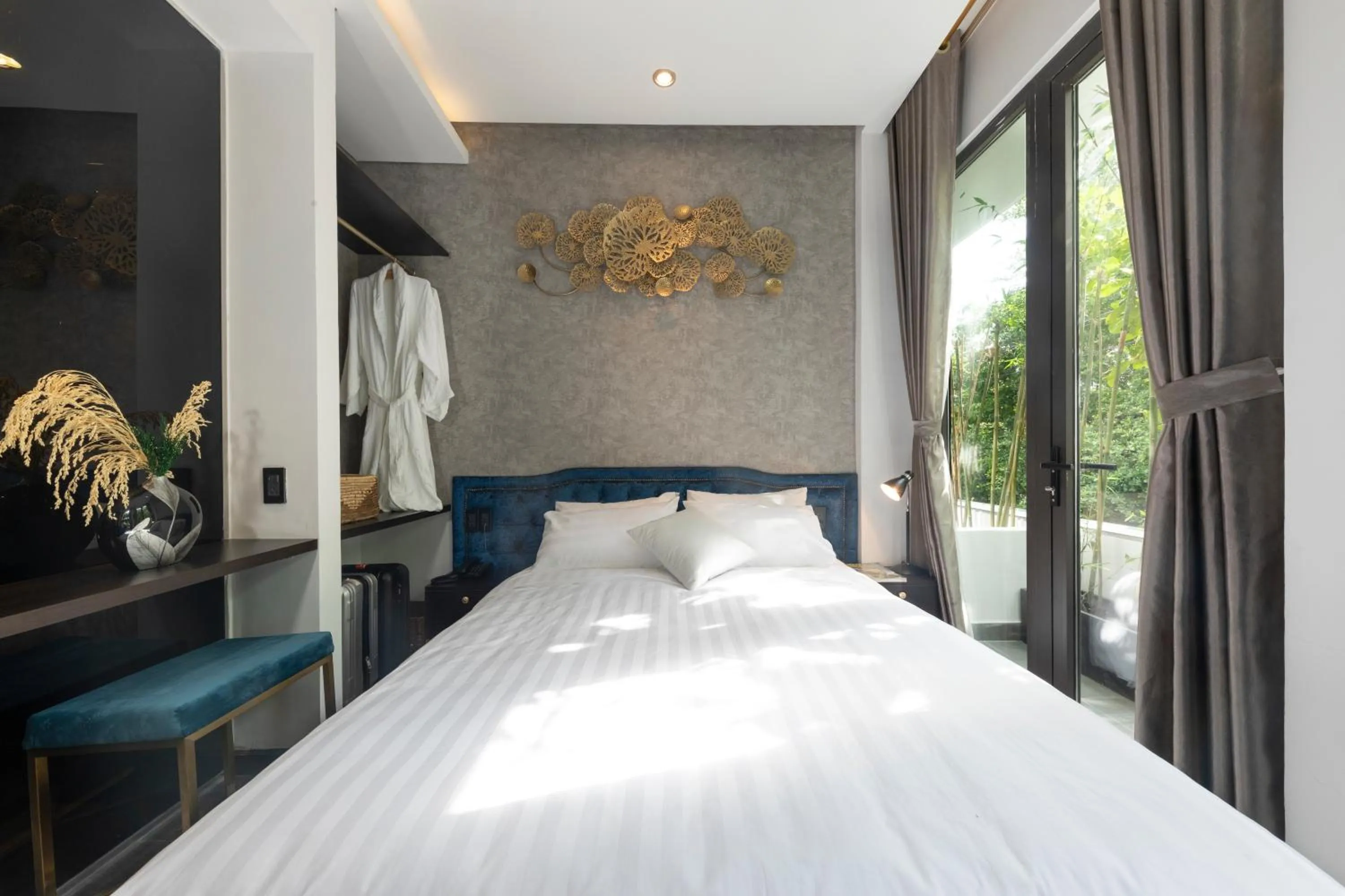 Bed in KunKin Luxury Hotel & Apartment