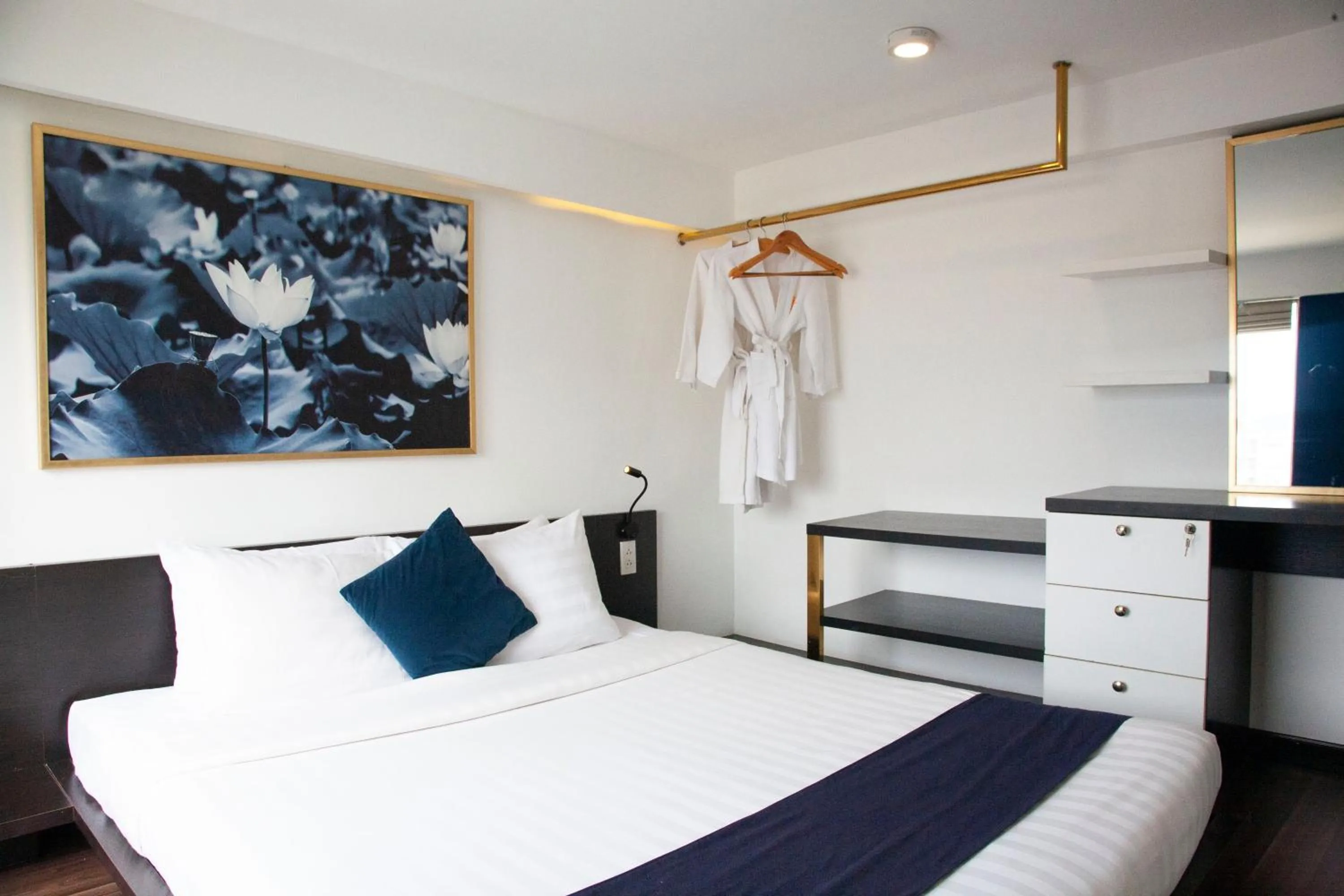 Bed in KunKin Luxury Hotel & Apartment