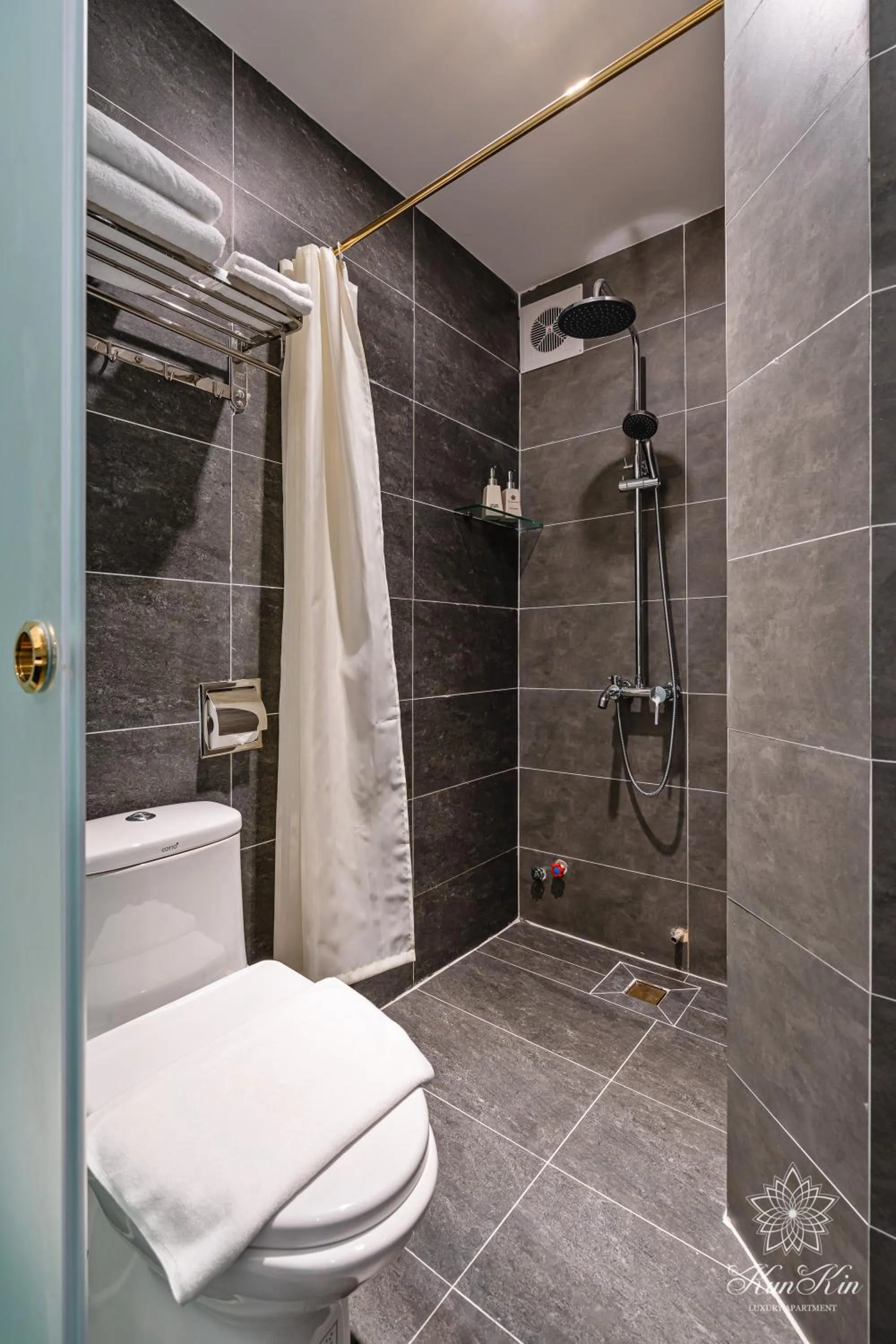Bathroom in KunKin Luxury Hotel & Apartment