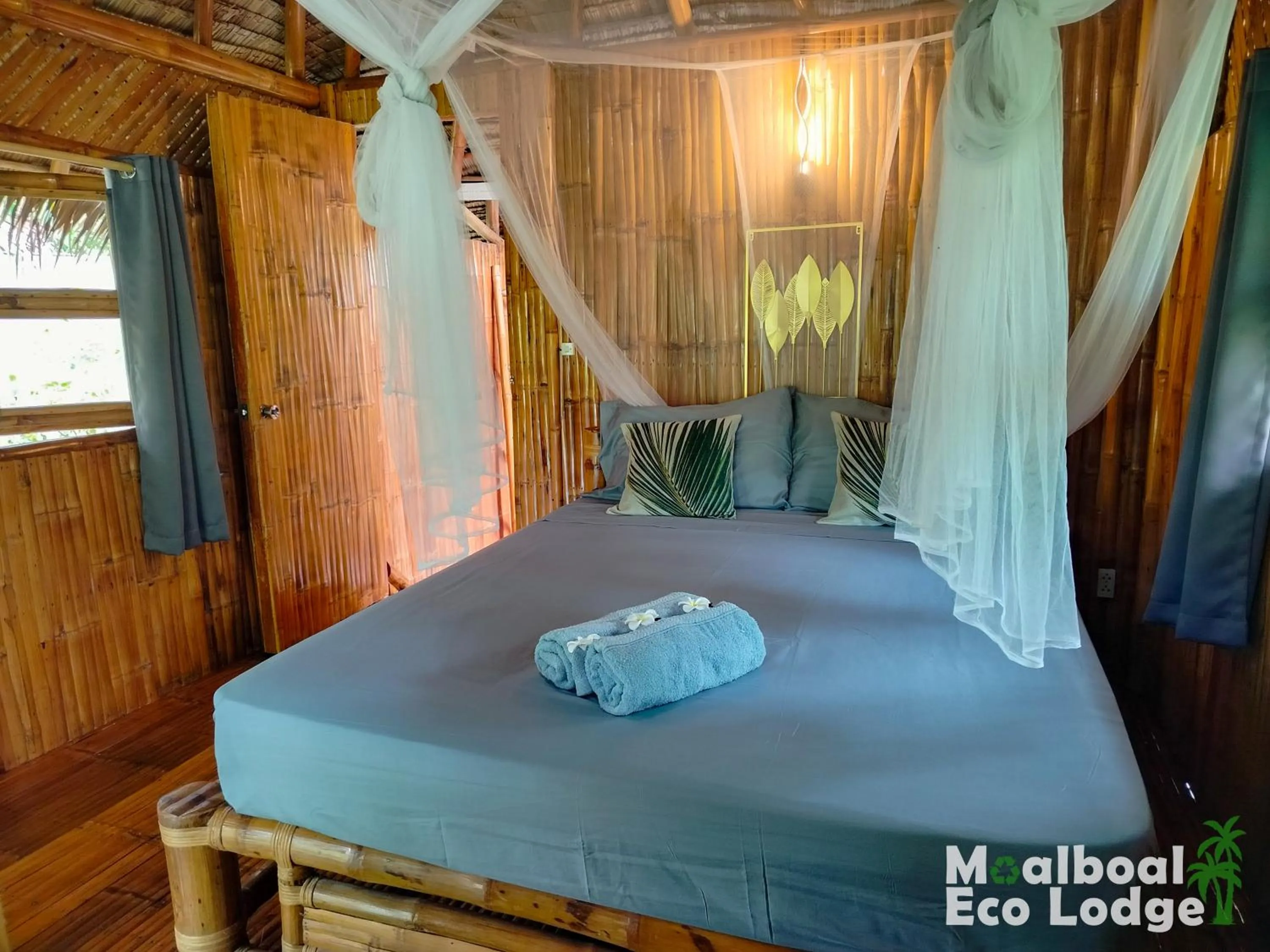 Bed in Moalboal Eco Lodge