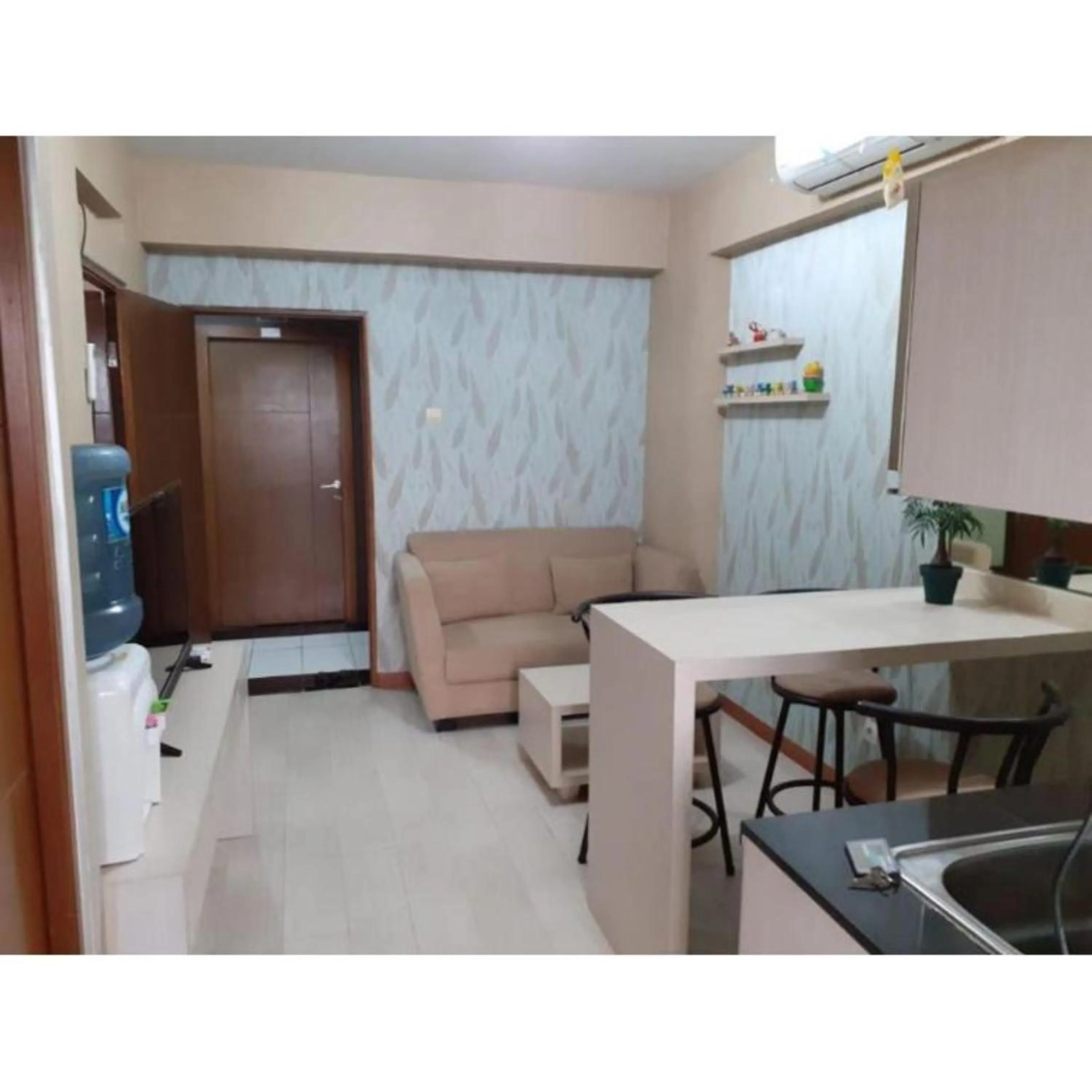 Living room in Gateway Apartment Cicadas by DB Property