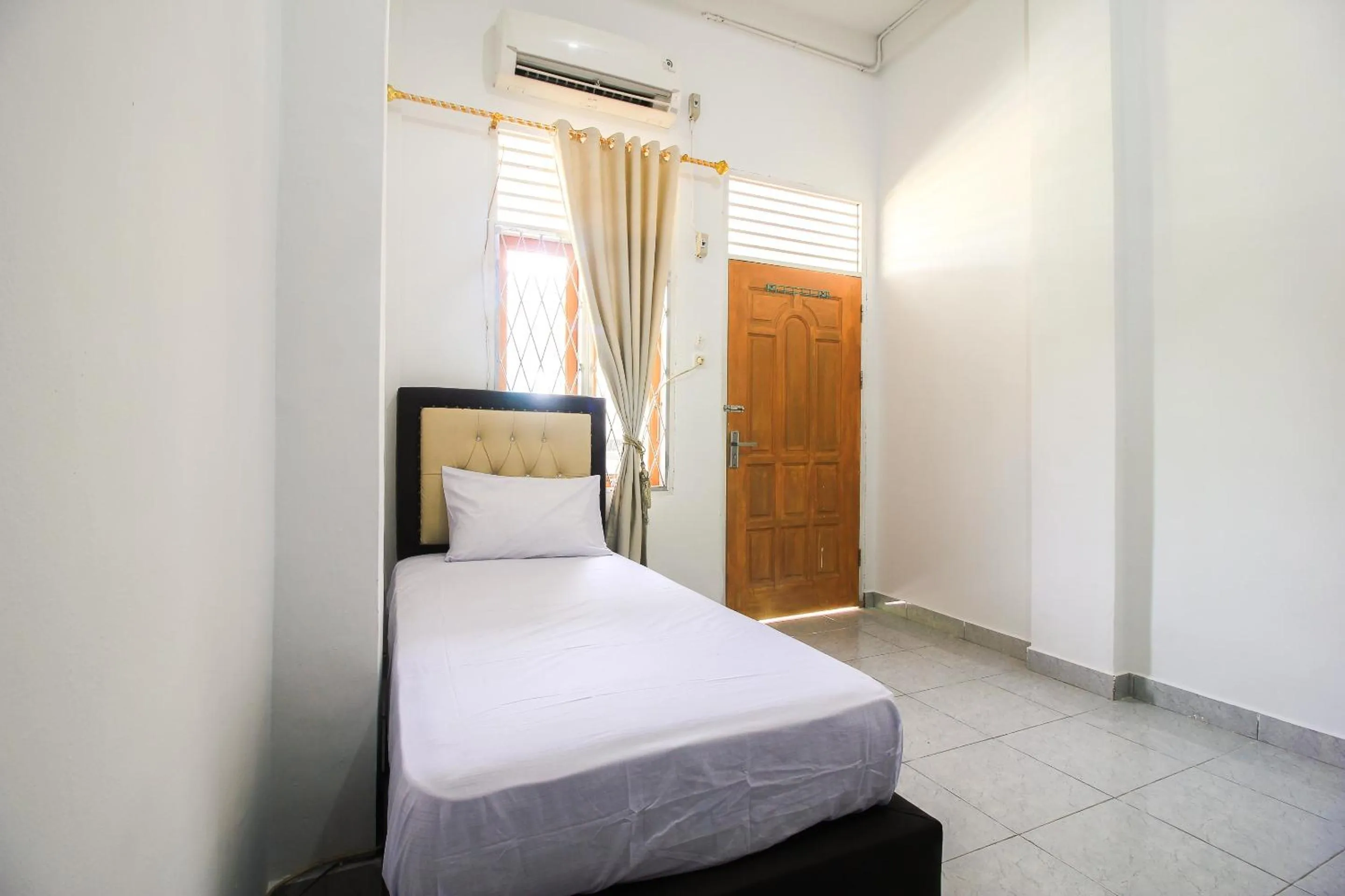Bedroom in OYO Life 2553 Kost Daya