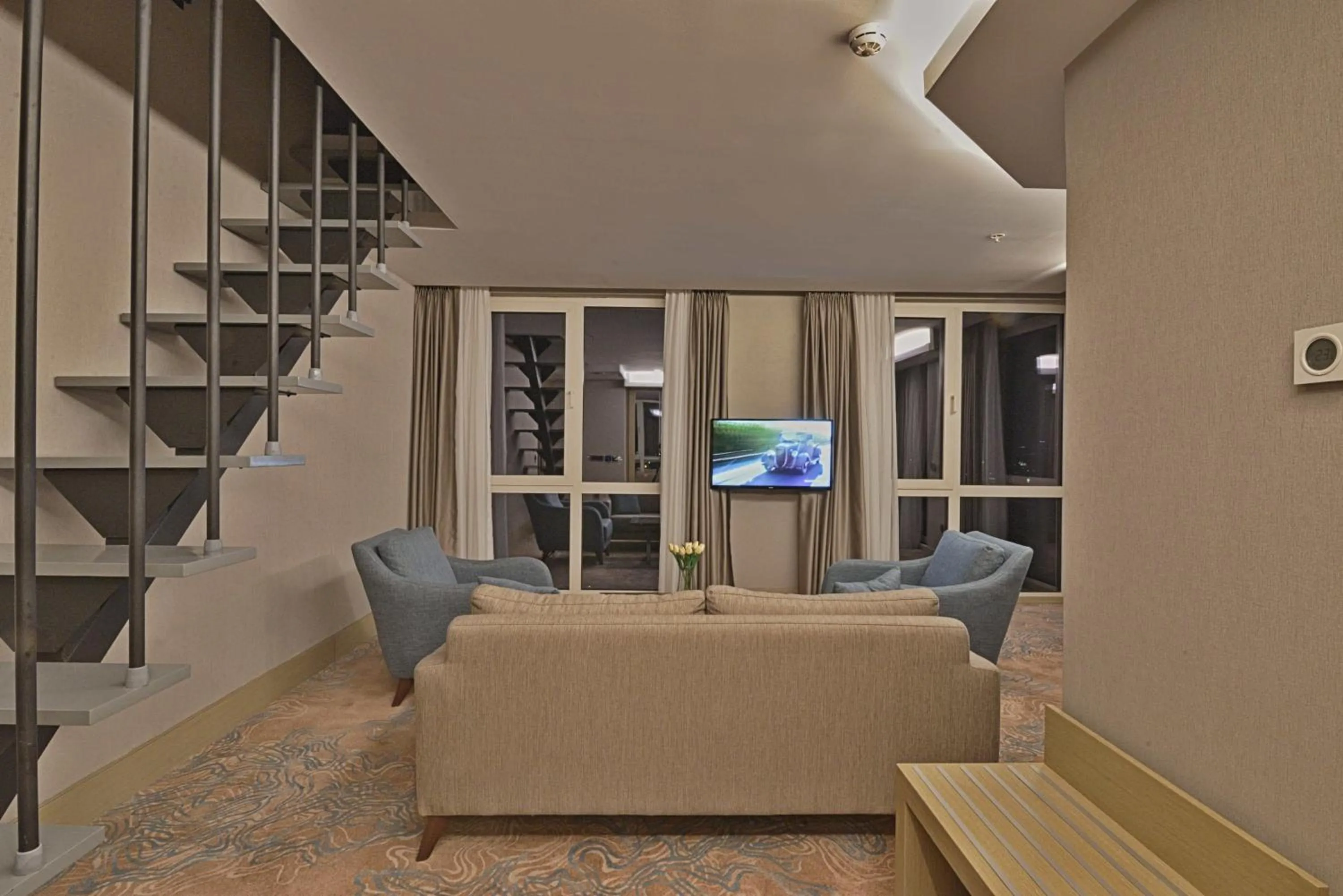 Communal lounge/ TV room in Best Western Premier Ottoperla Hotel