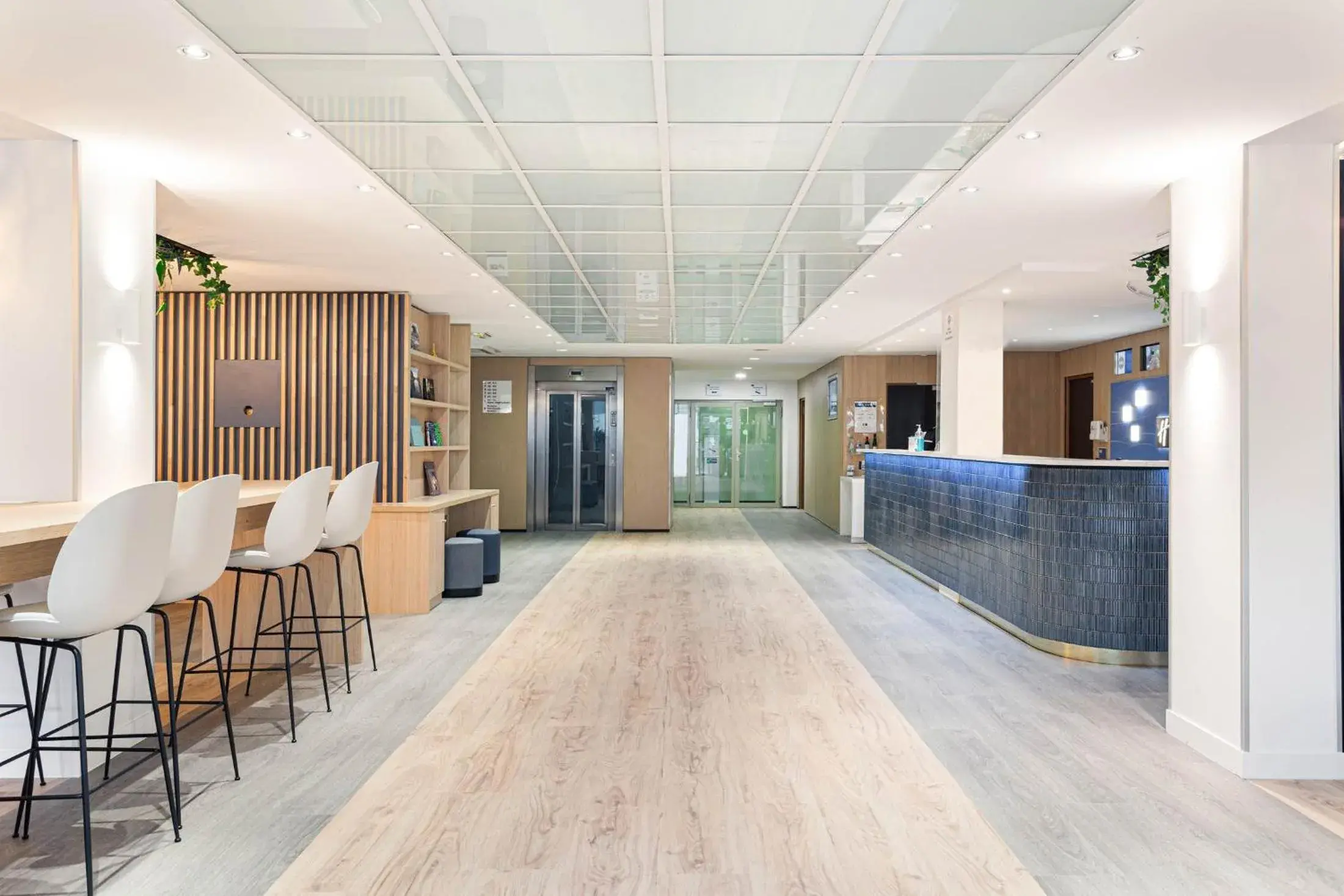 Lobby or reception in Holiday Inn Express Paris-Canal De La Villette by IHG Lobby or reception in Holiday Inn Express Paris-Canal De La Villette by IHG