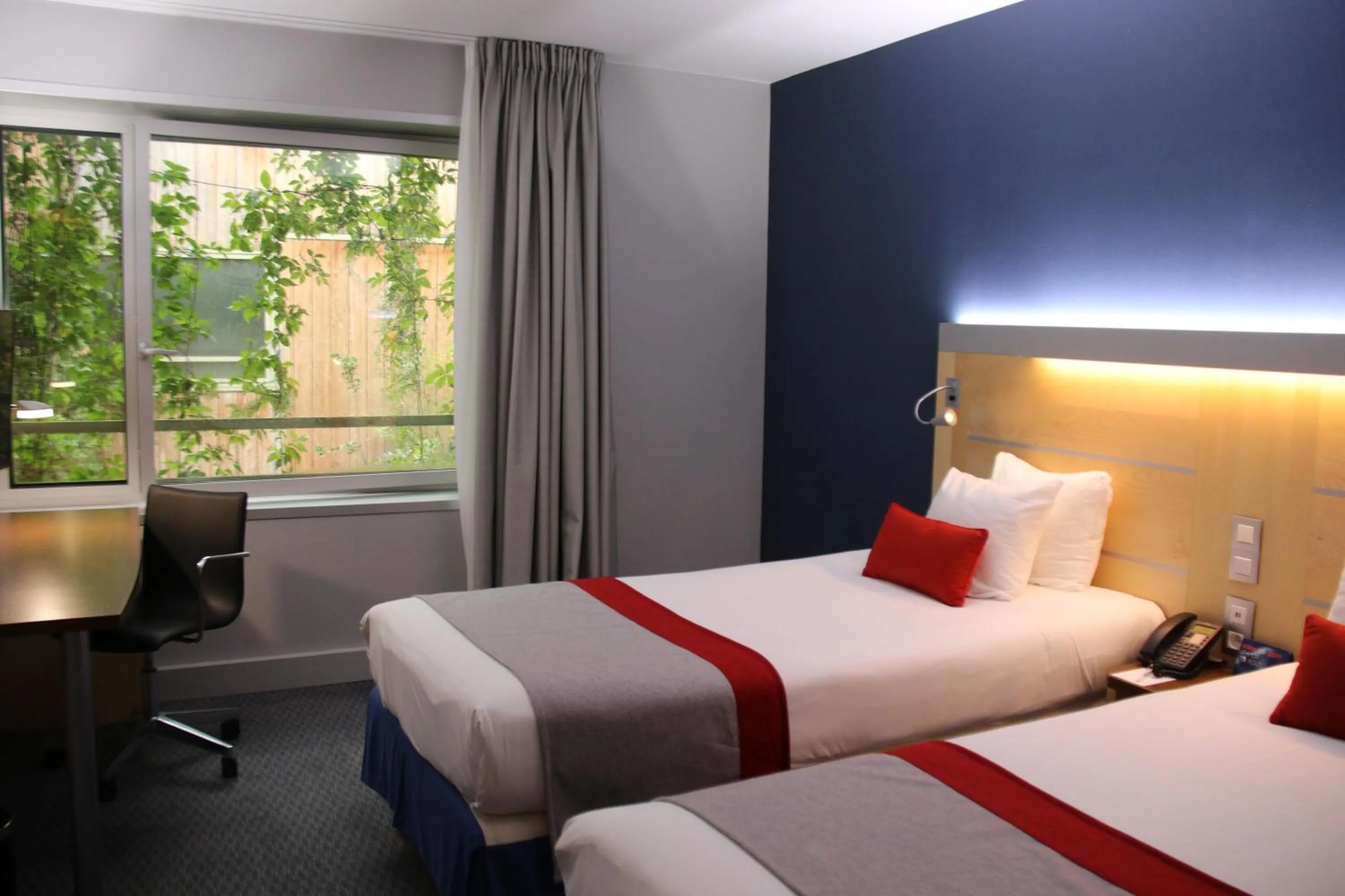 Bedroom, Bed in Holiday Inn Express Paris-Canal De La Villette by IHG