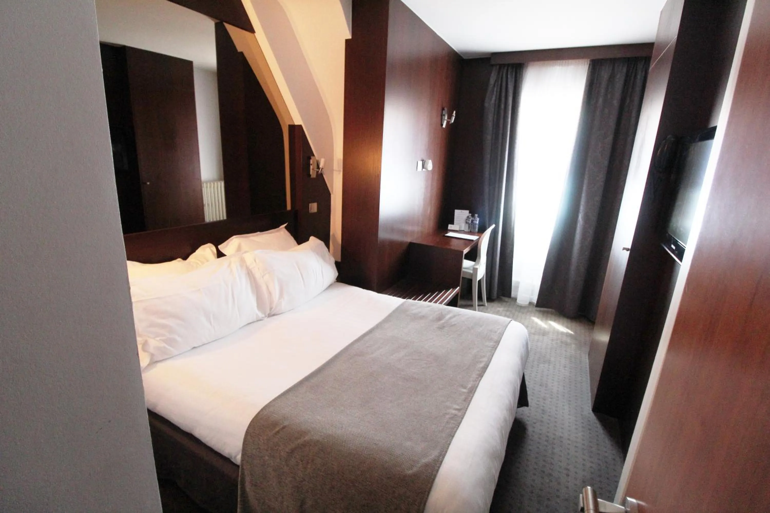 Bed in Hotel des Tonneliers