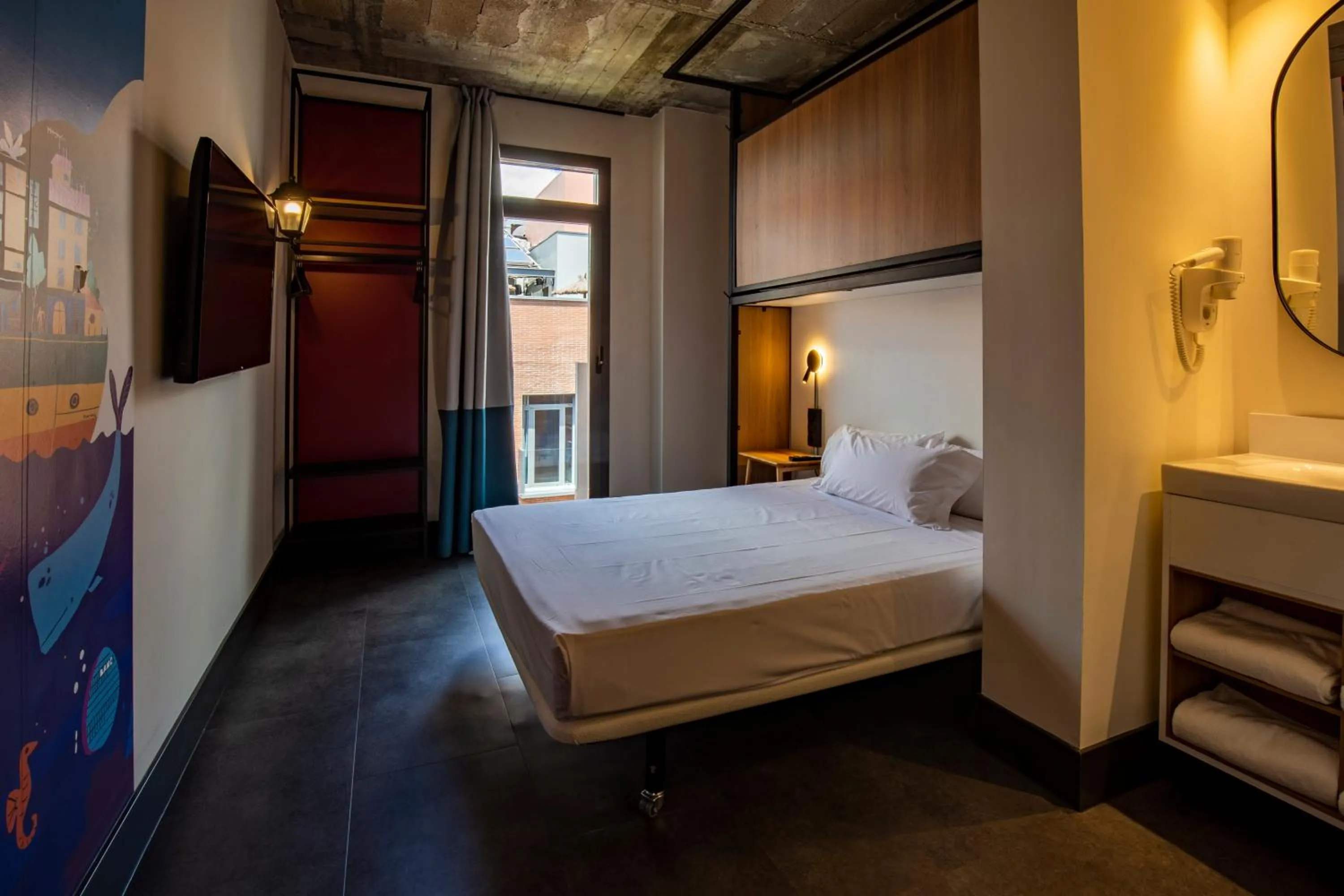 Photo of the whole room, Bed in The Central House Madrid Lavapiés