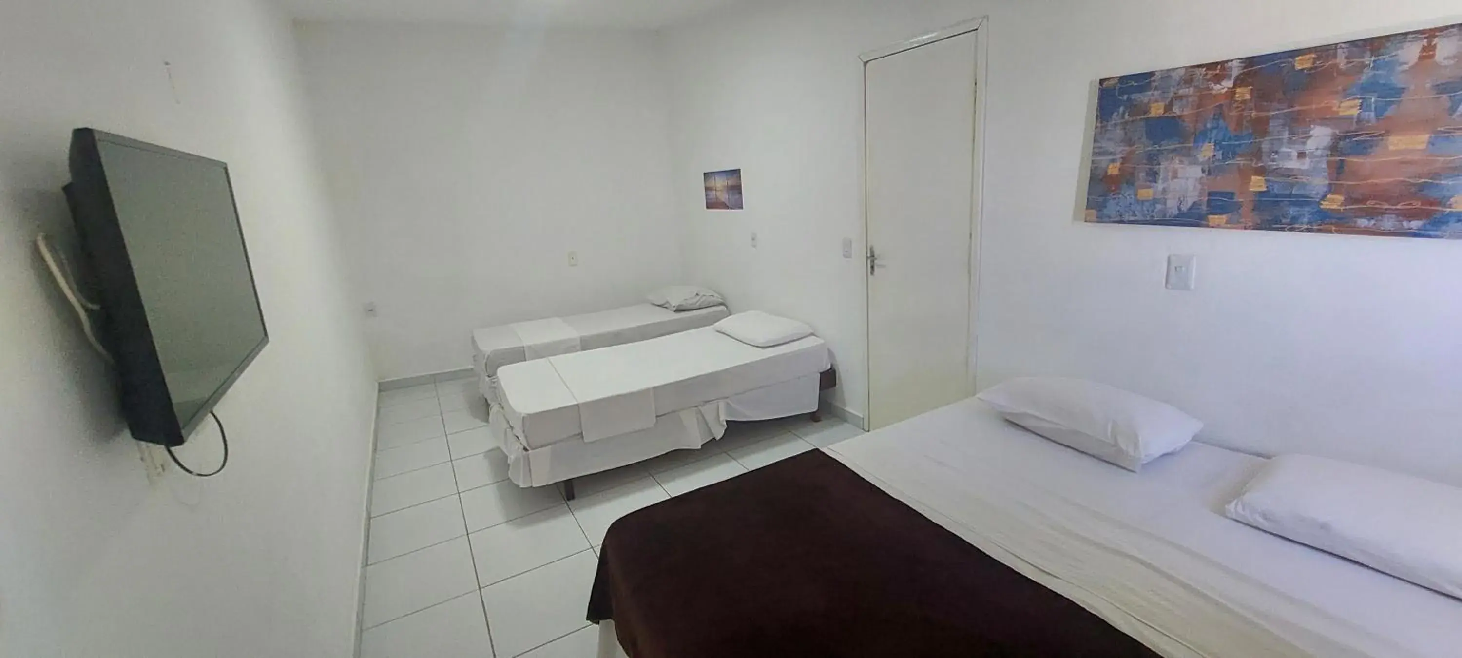 Quadruple Room in Santorini Praia Hotel Quadruple Room in Santorini Praia Hotel