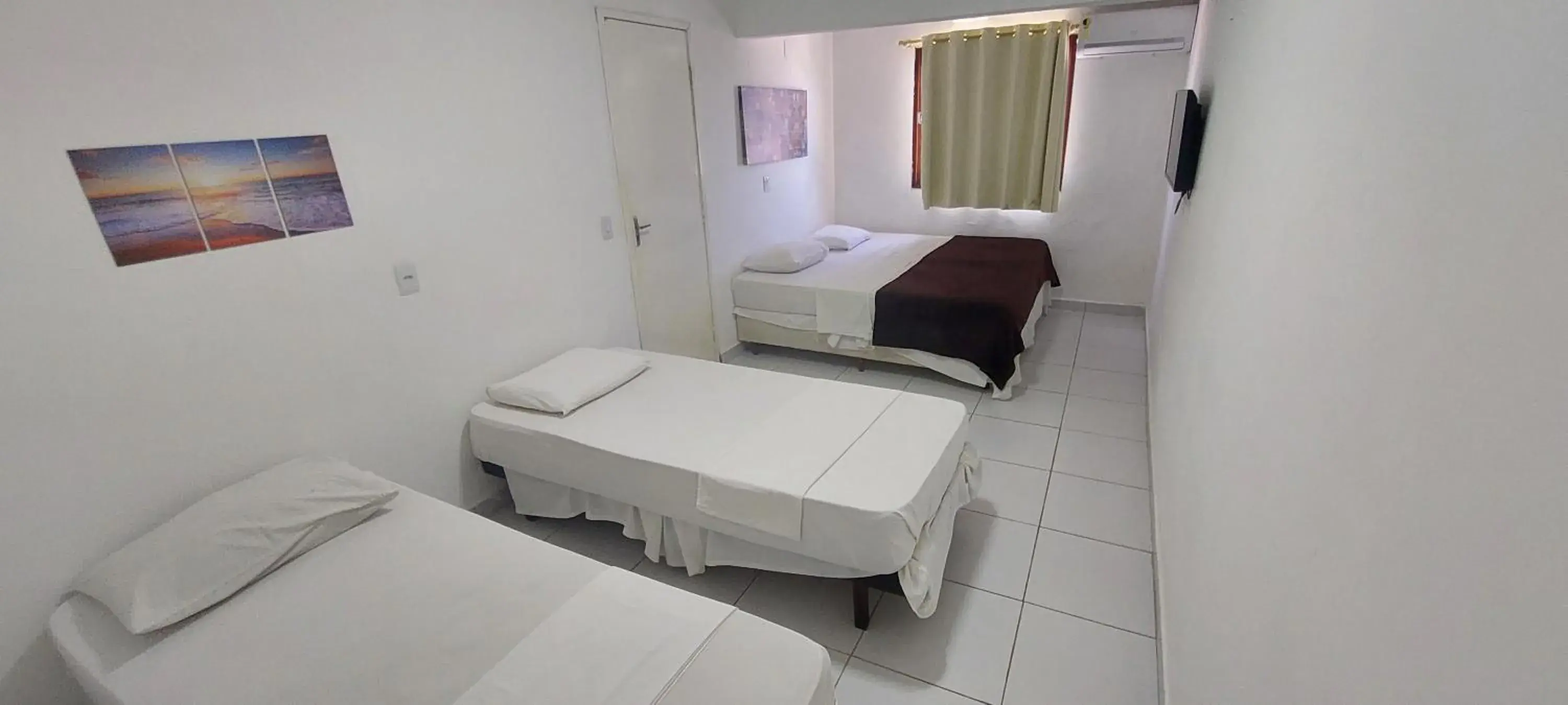 Quadruple Room in Santorini Praia Hotel Quadruple Room in Santorini Praia Hotel