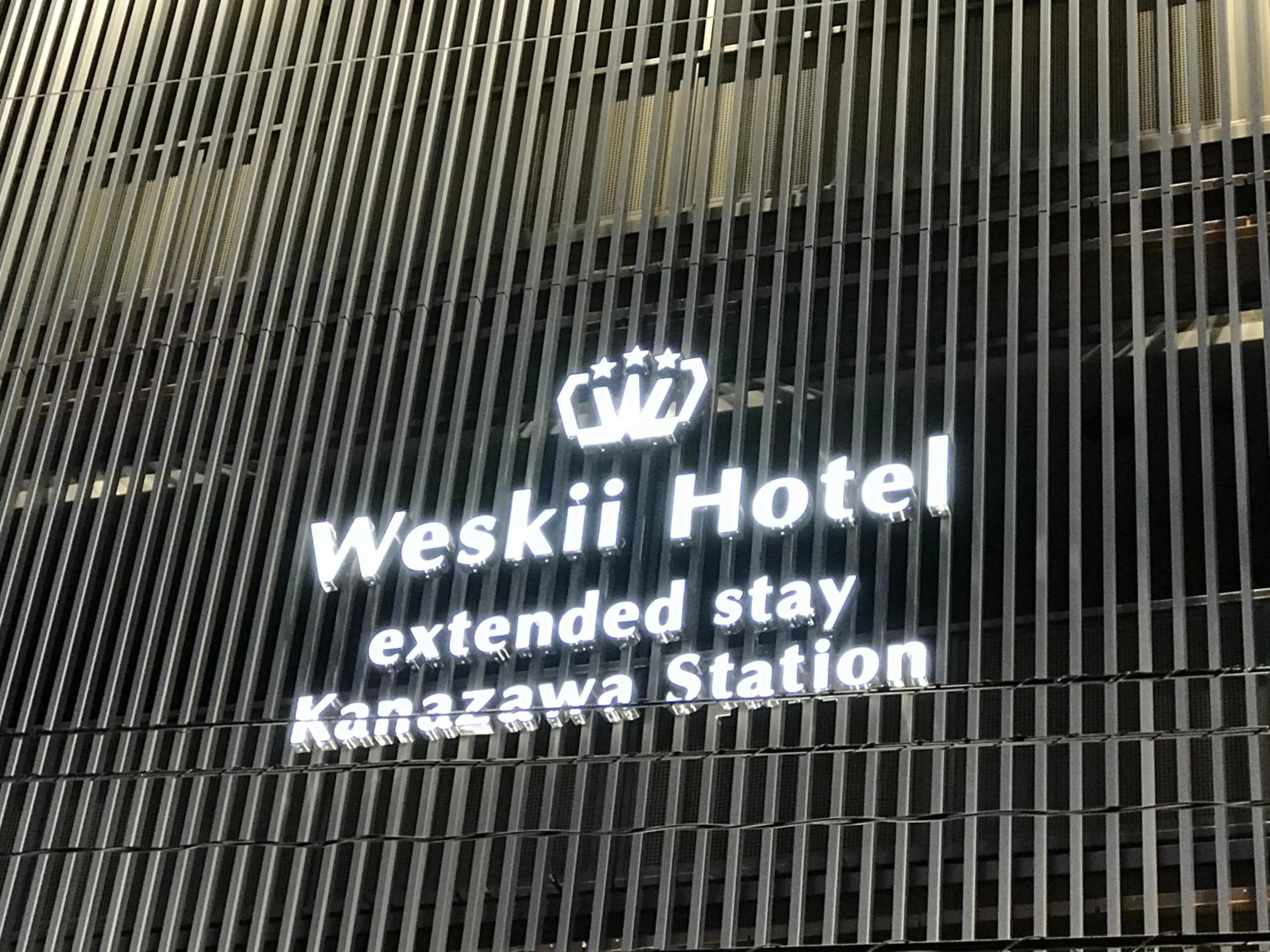 Property logo or sign in Weskii Hotel