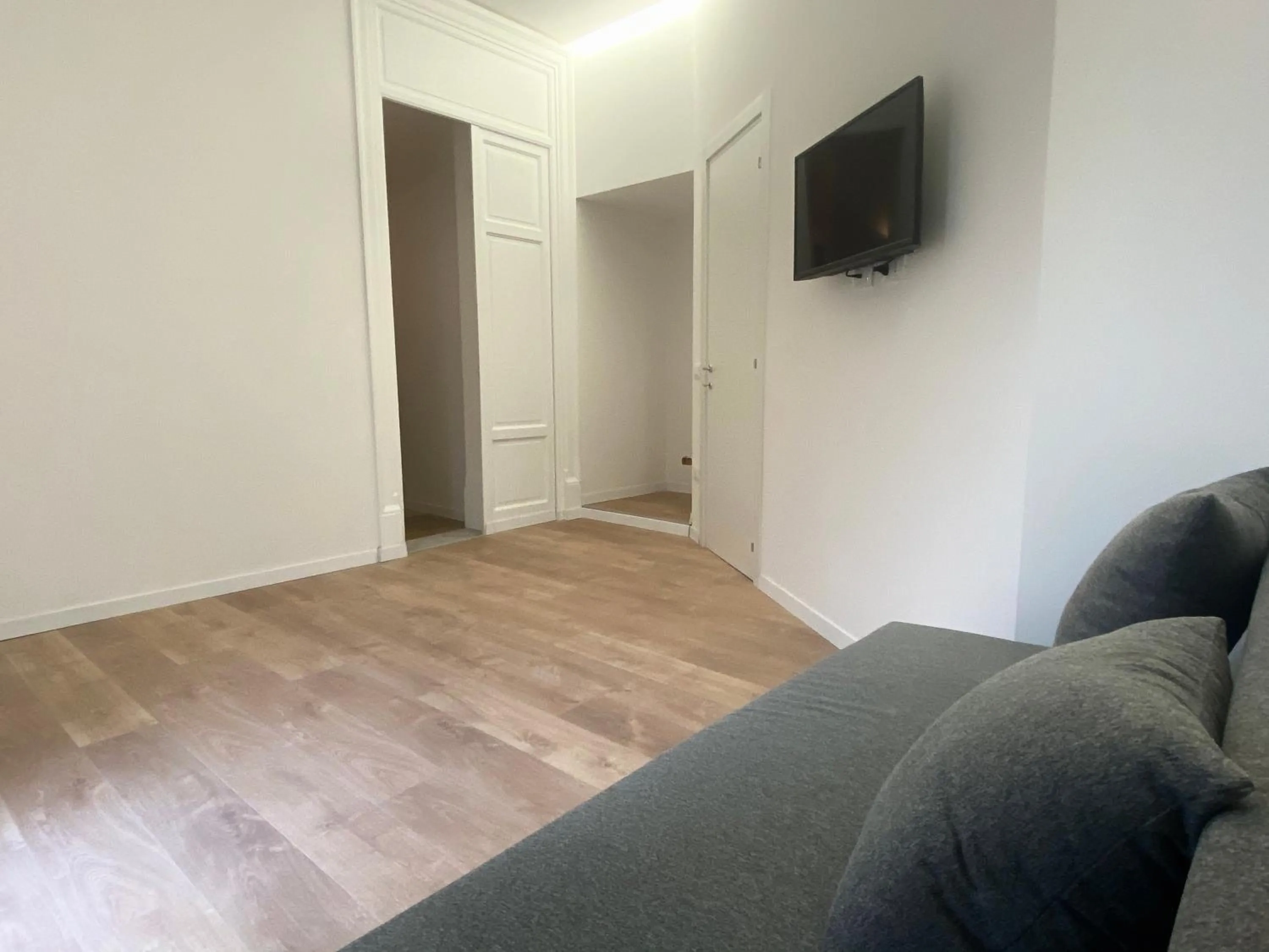 Communal lounge/ TV room in Piazza Florio Rooms