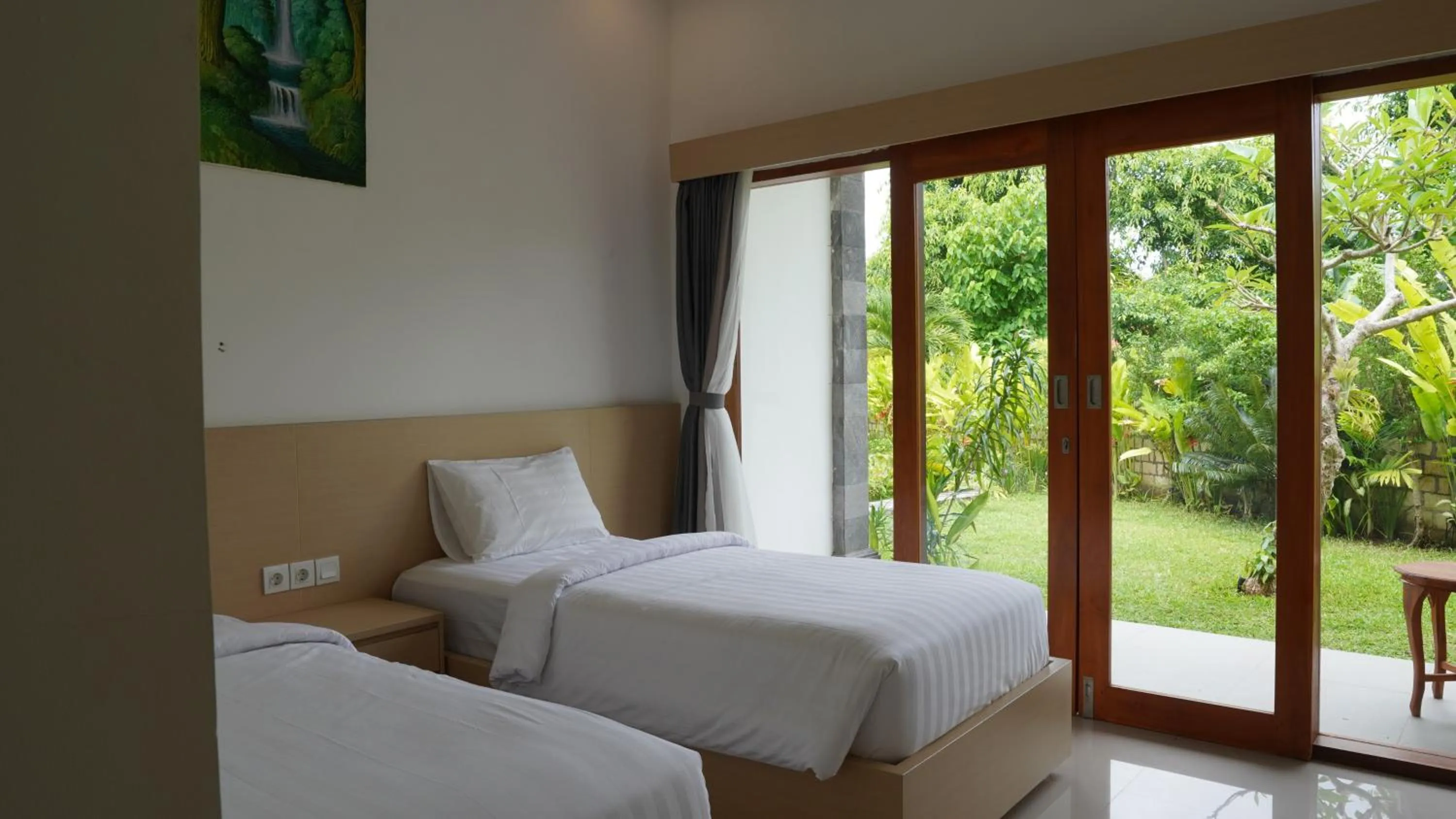 Bed in Artaloka Hotel & Restaurant