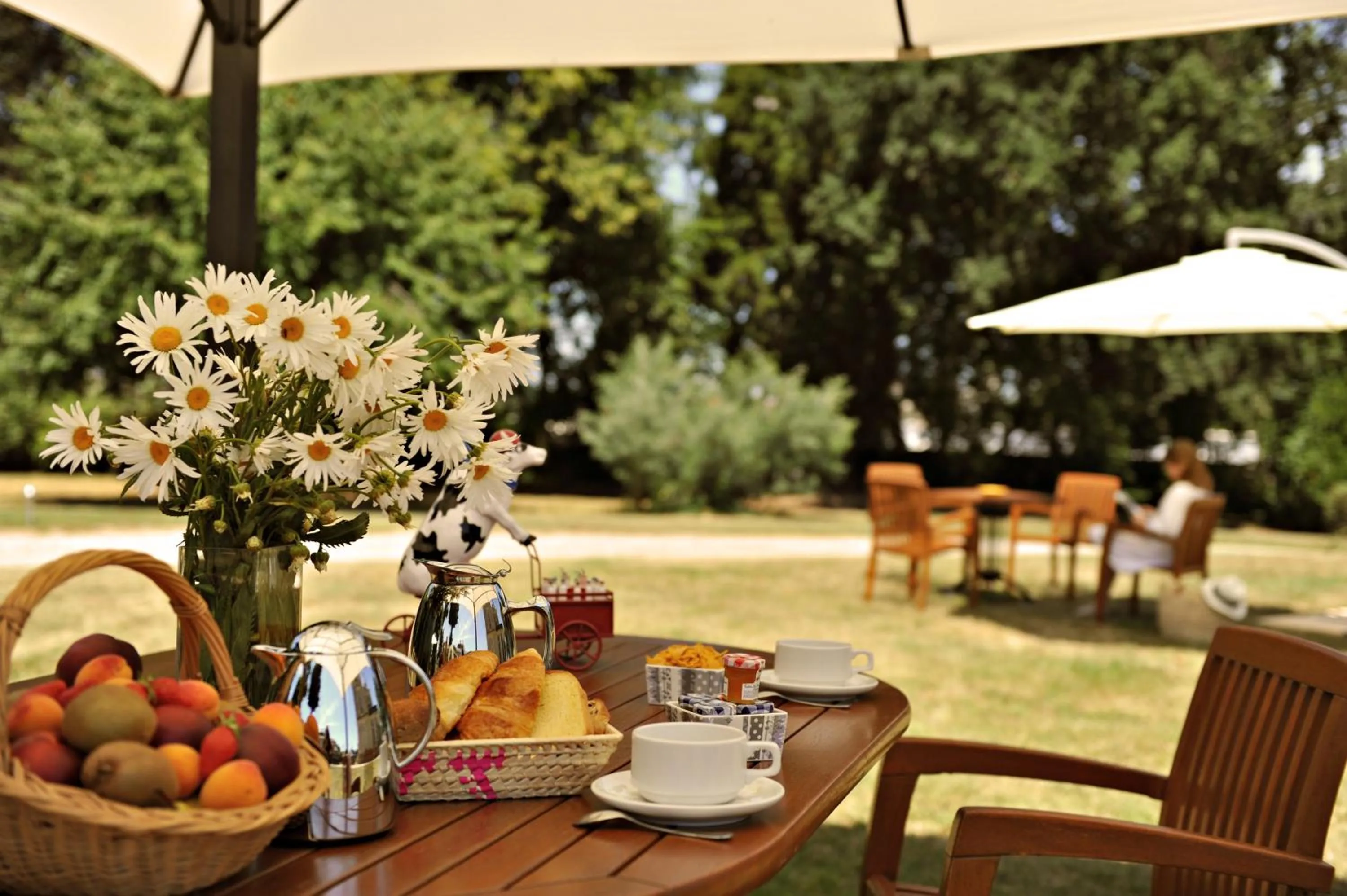 Garden in Logis Le Parc Hotel & Spa