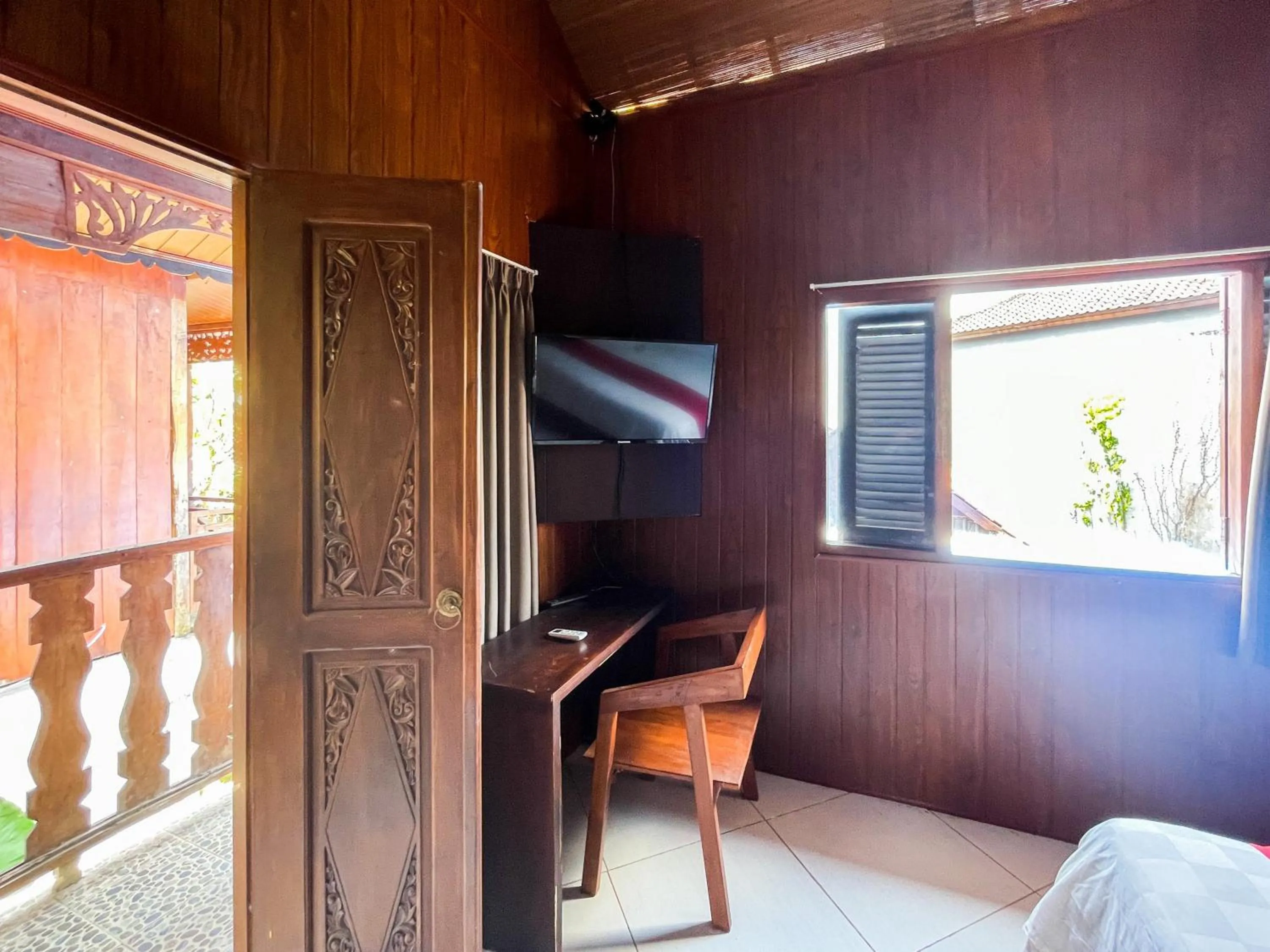 Seating area in RedDoorz at Villa Krisna Balangan Beach