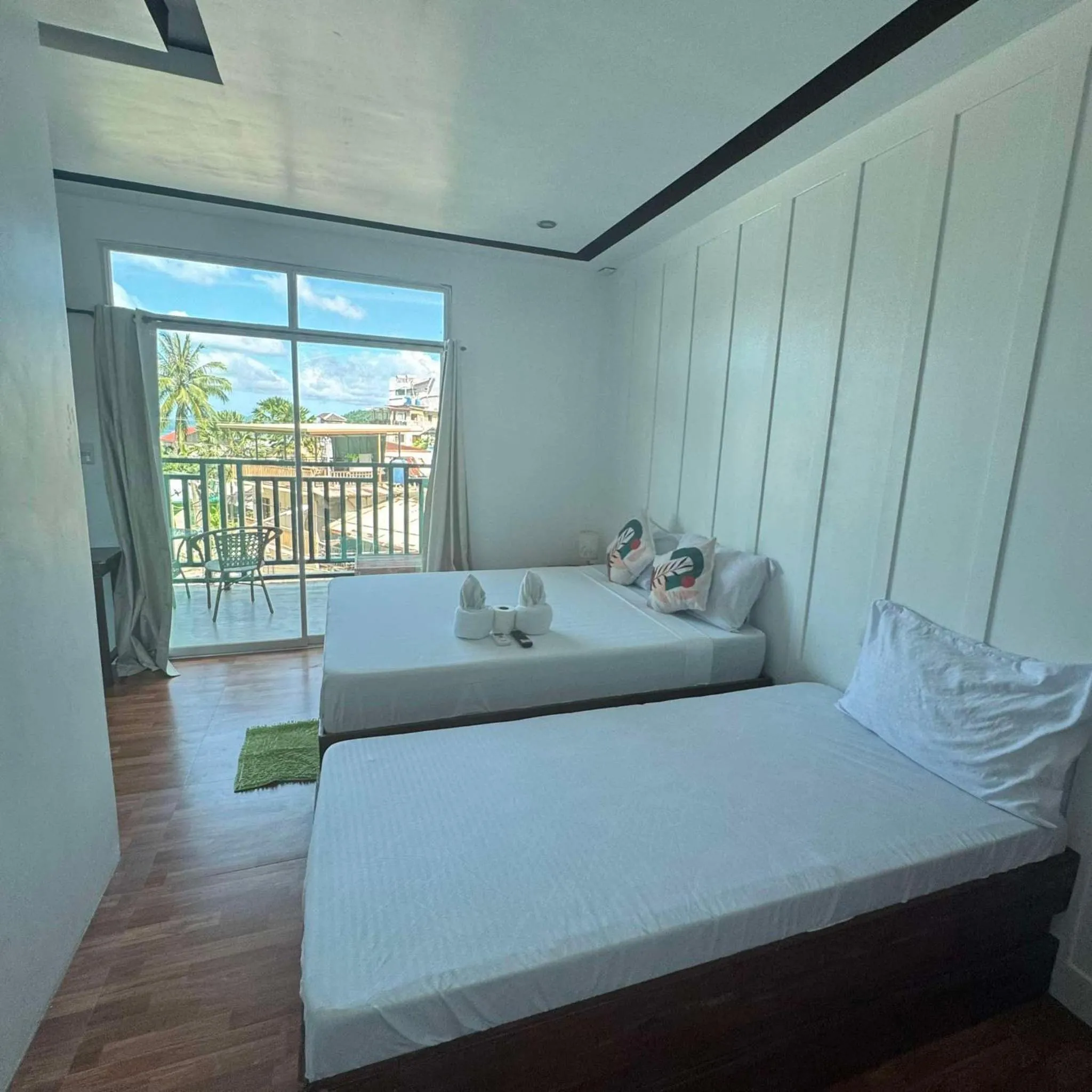 Bed in MANANQUIL TRAVEL LODGE