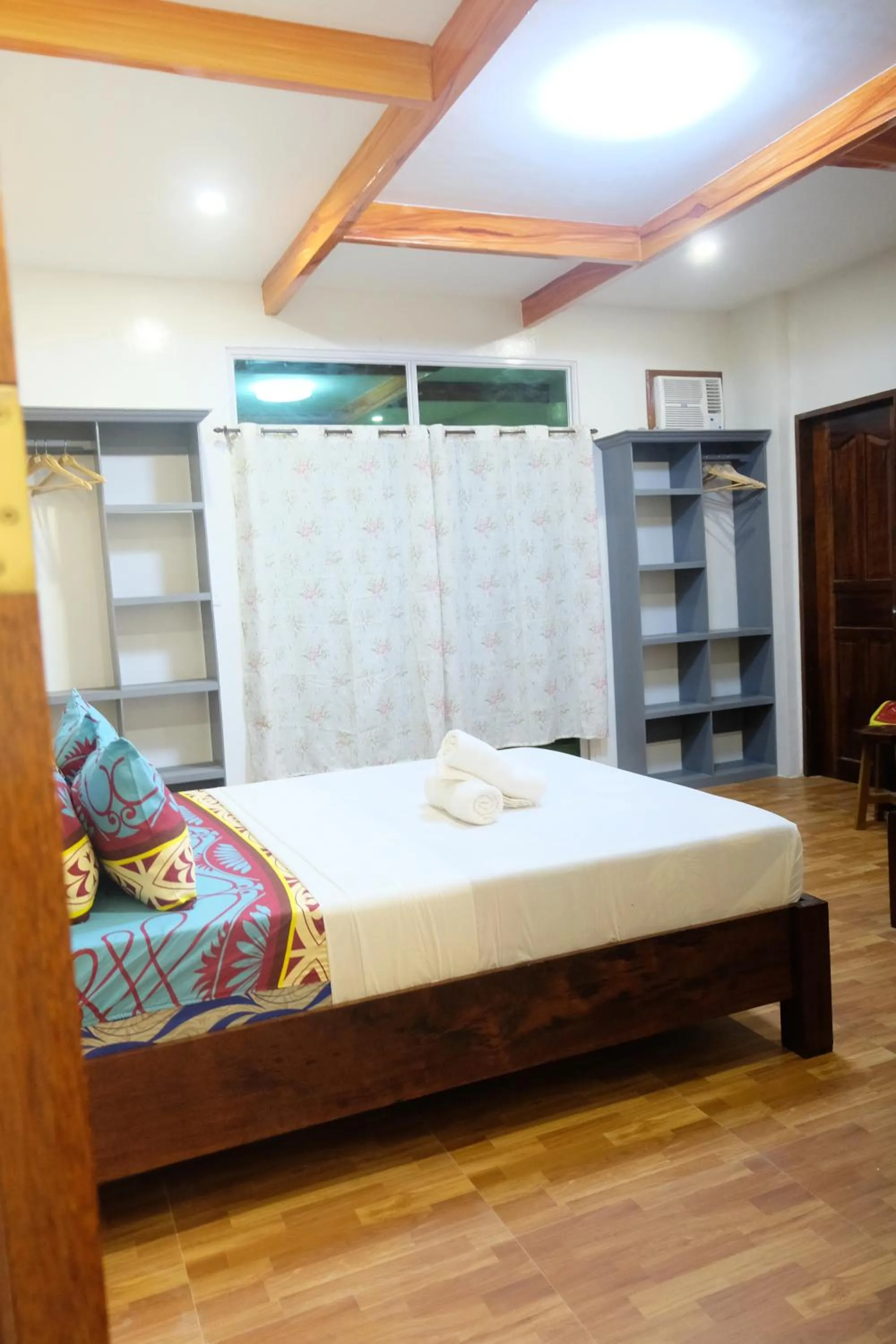 Bed in MANANQUIL TRAVEL LODGE