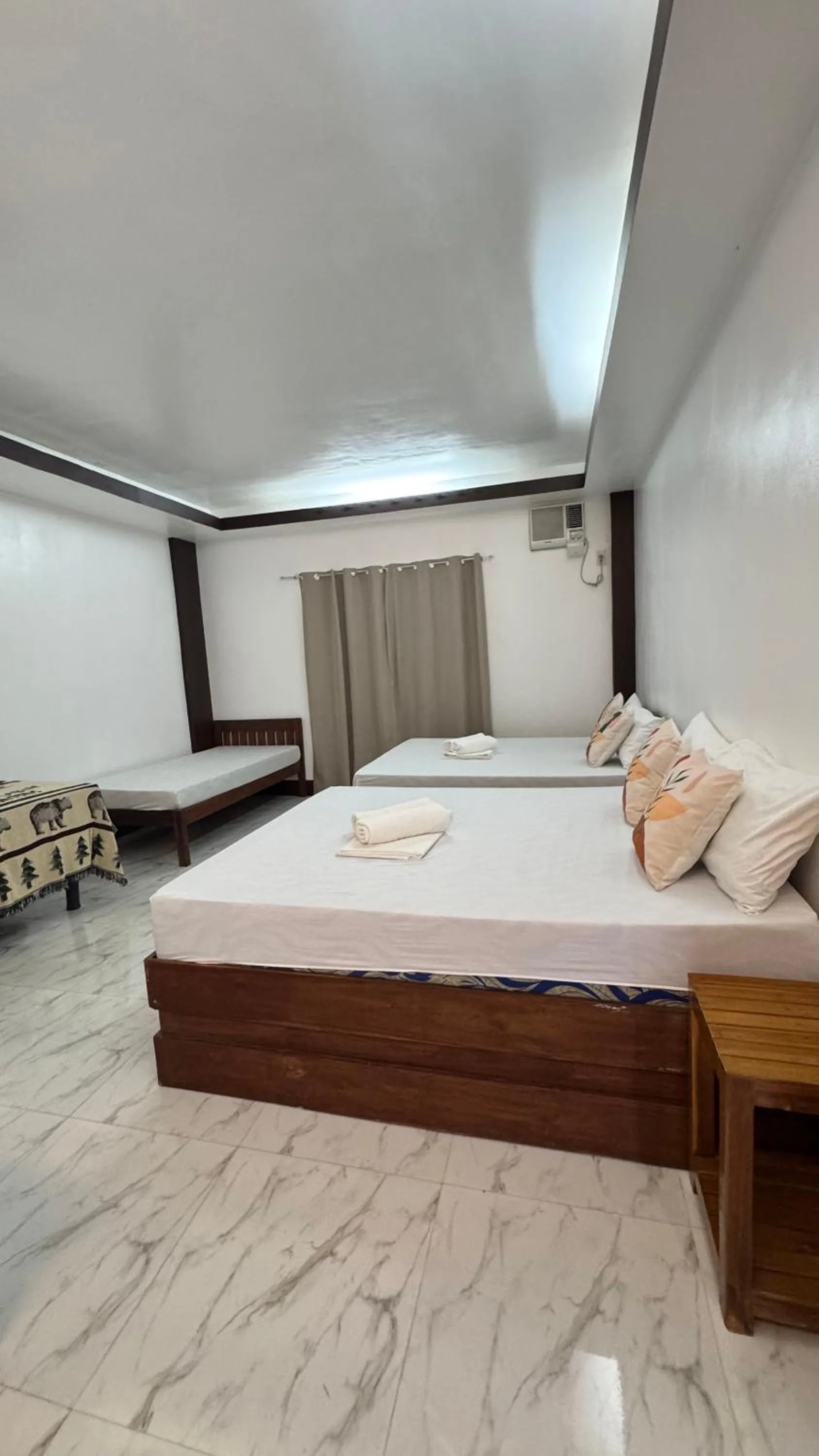 Bed in MANANQUIL TRAVEL LODGE