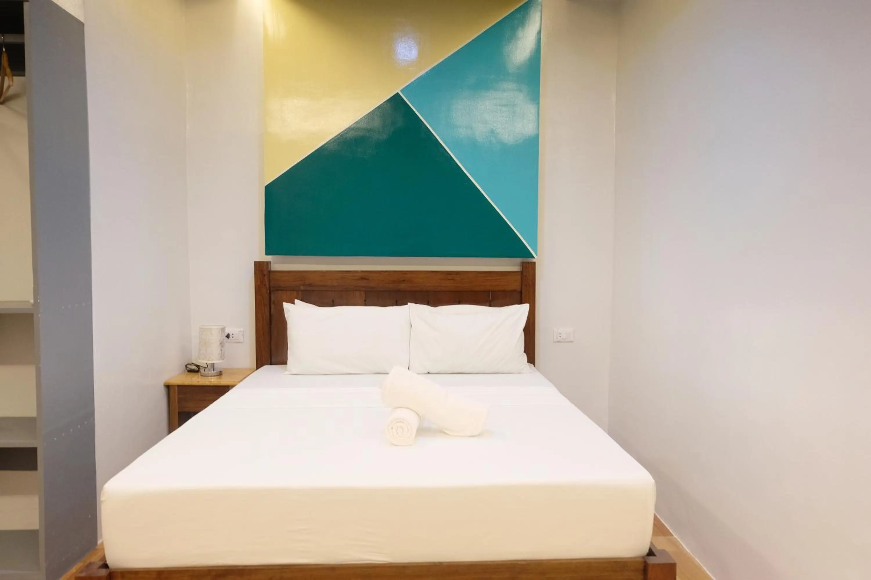 Bed in MANANQUIL TRAVEL LODGE