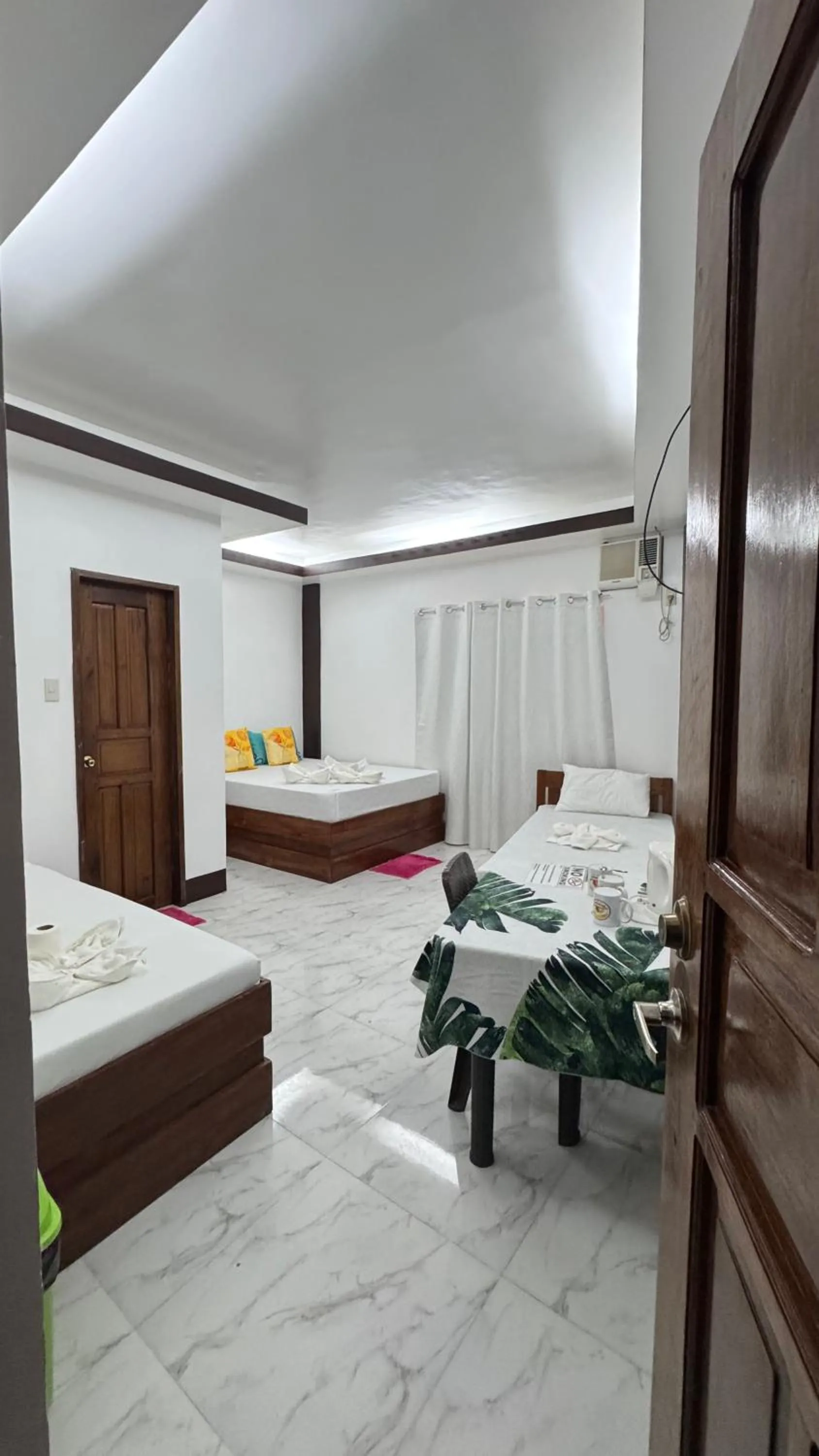 Bed in MANANQUIL TRAVEL LODGE