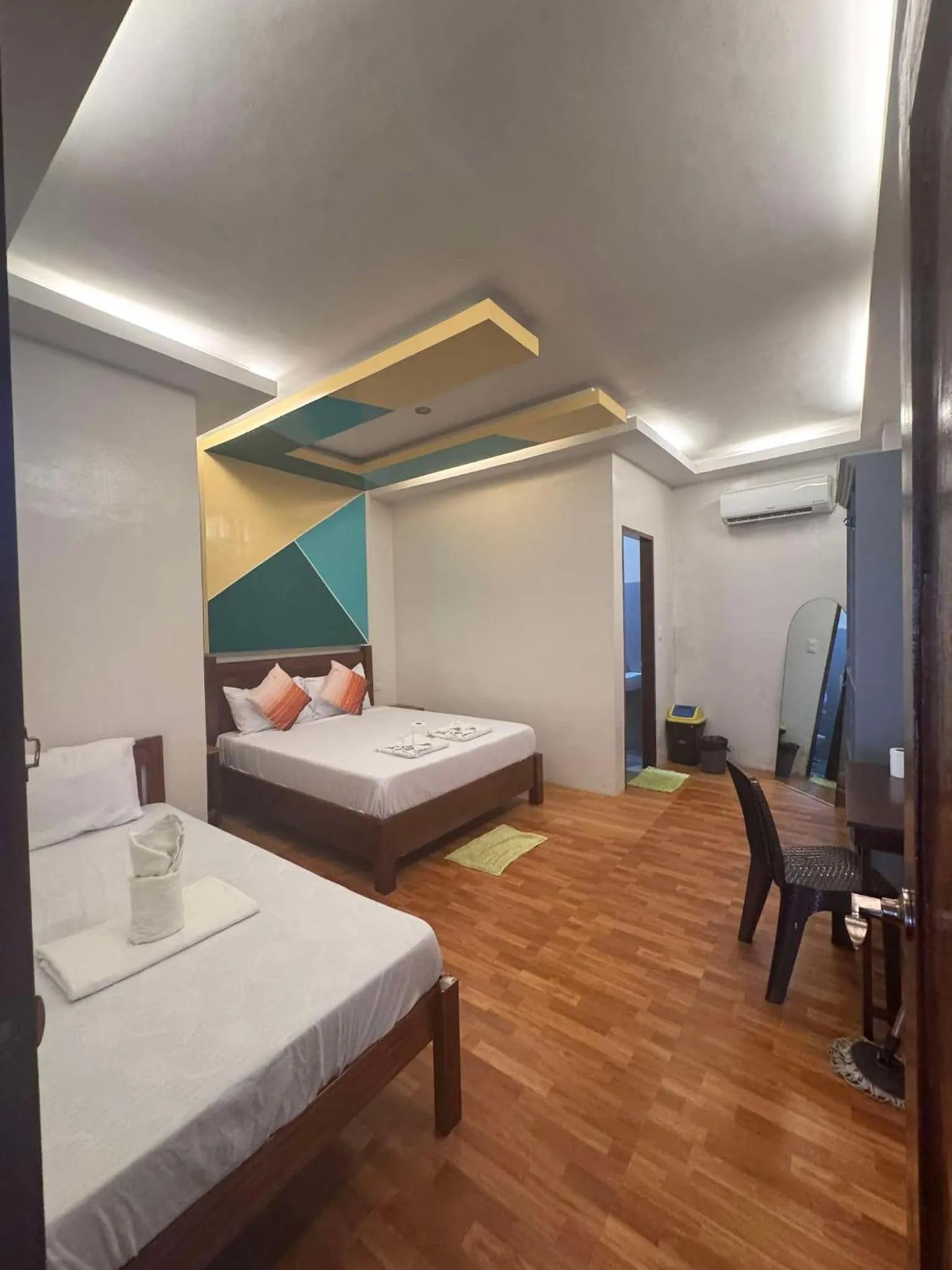 Bed in MANANQUIL TRAVEL LODGE