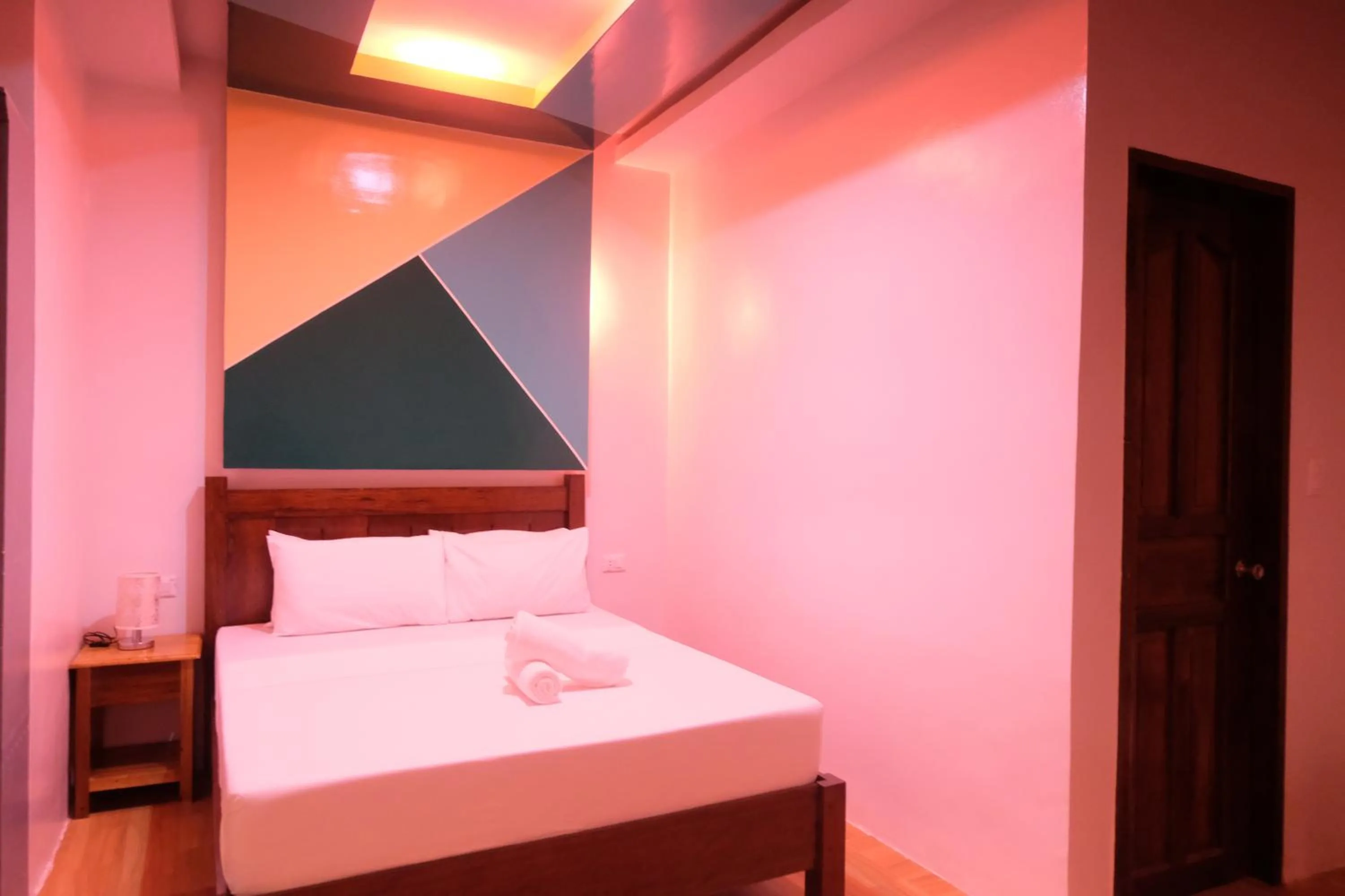 Bed in MANANQUIL TRAVEL LODGE