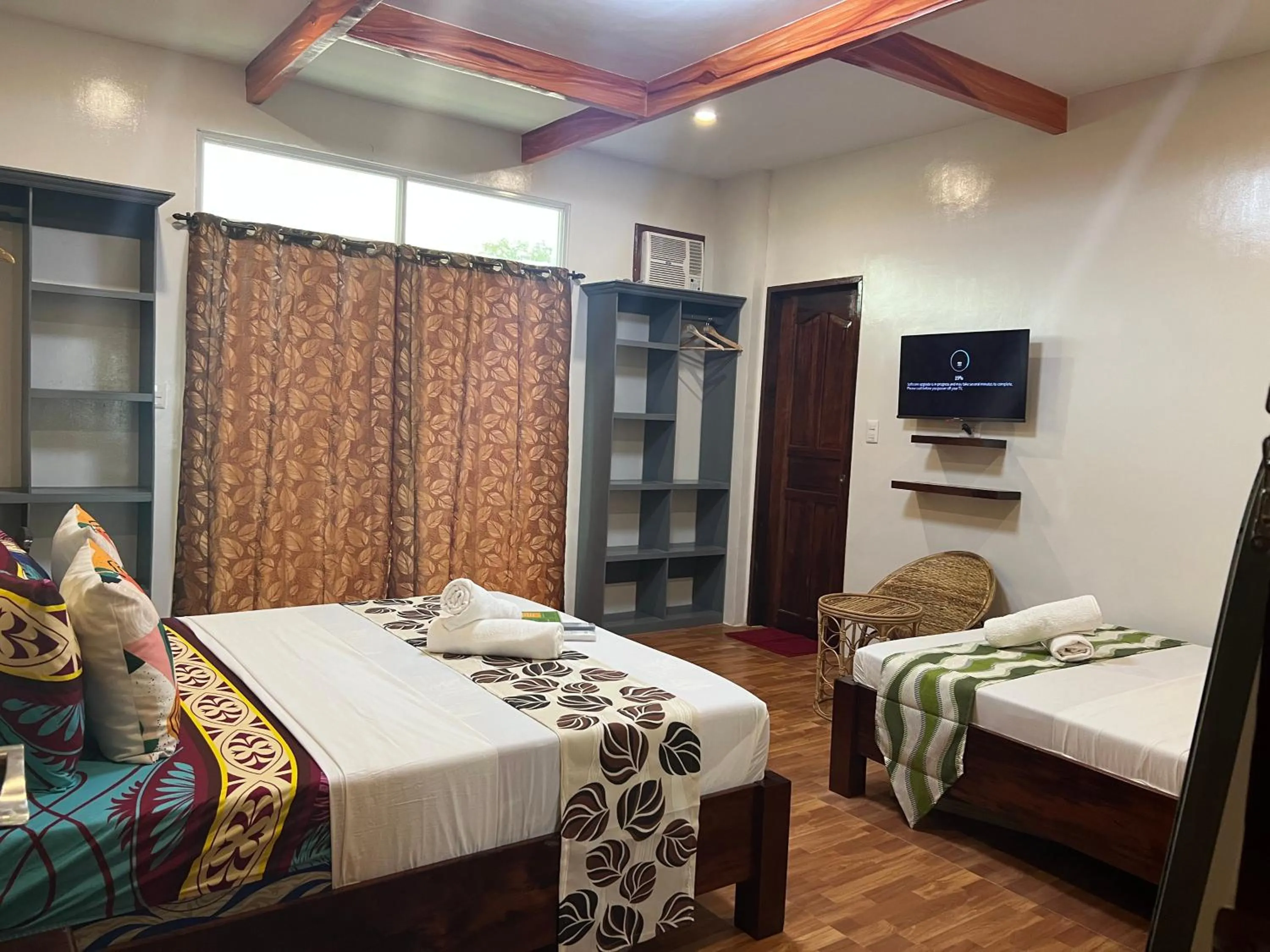 Bed in MANANQUIL TRAVEL LODGE
