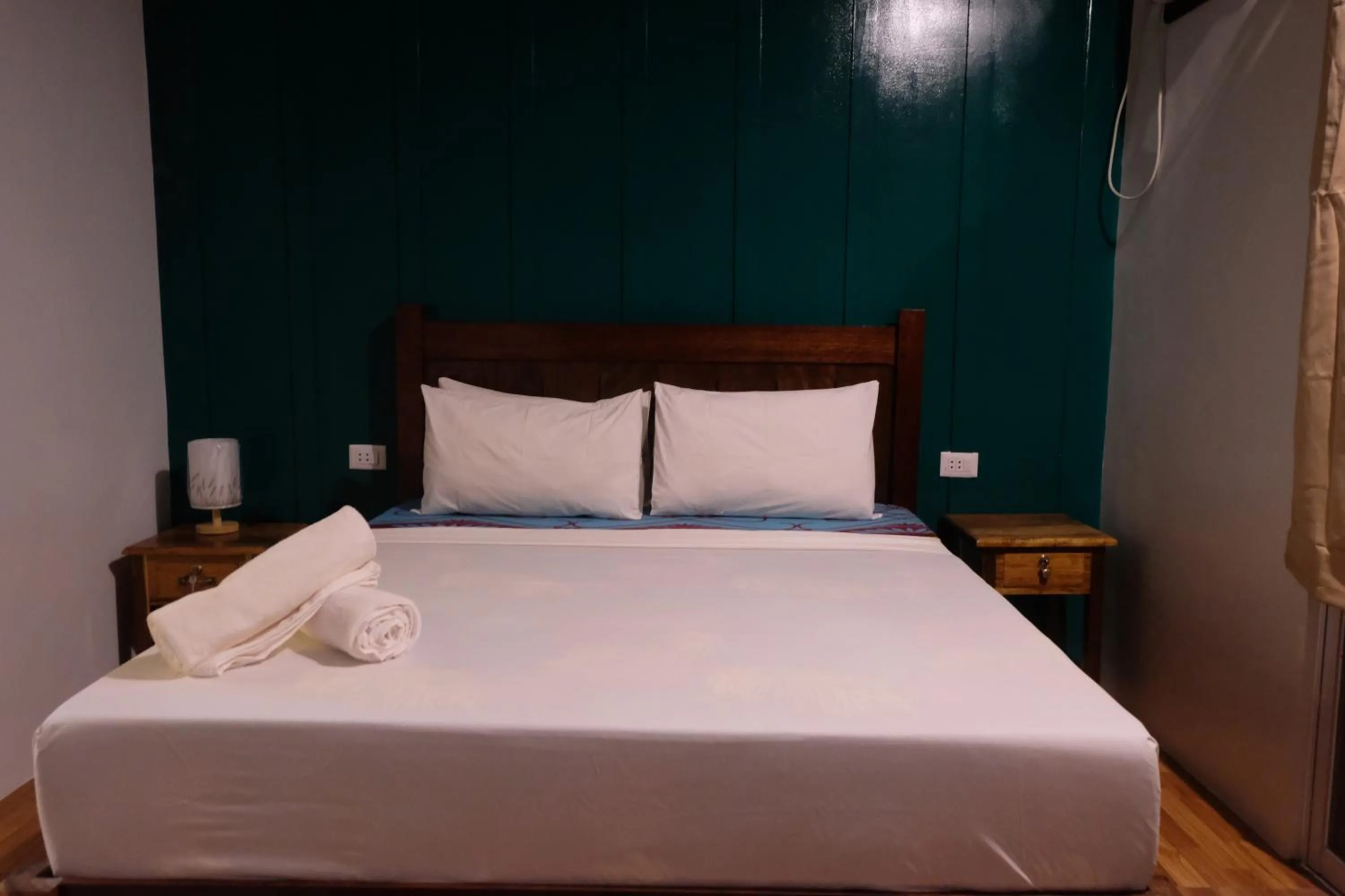 Bed in MANANQUIL TRAVEL LODGE