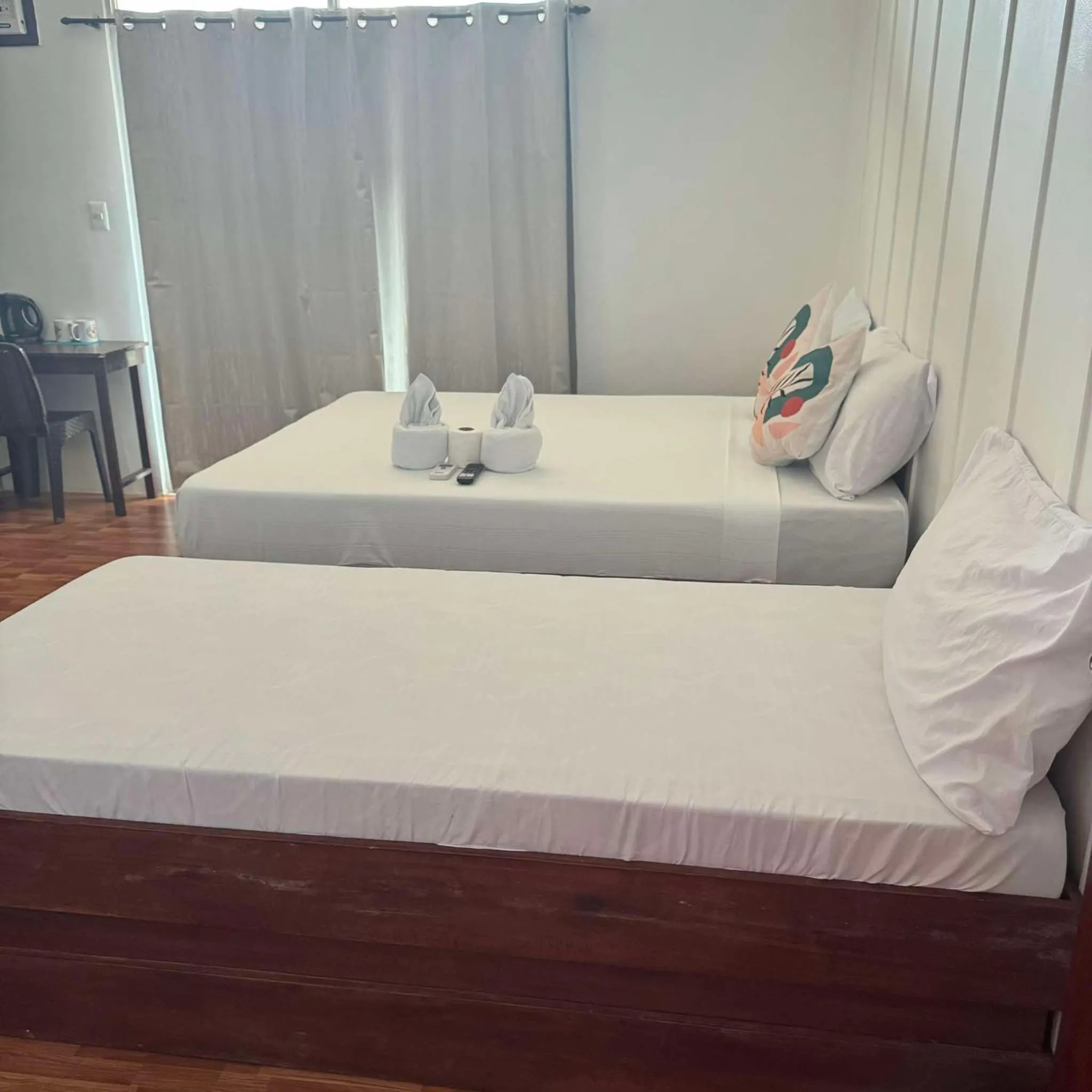 Bed in MANANQUIL TRAVEL LODGE