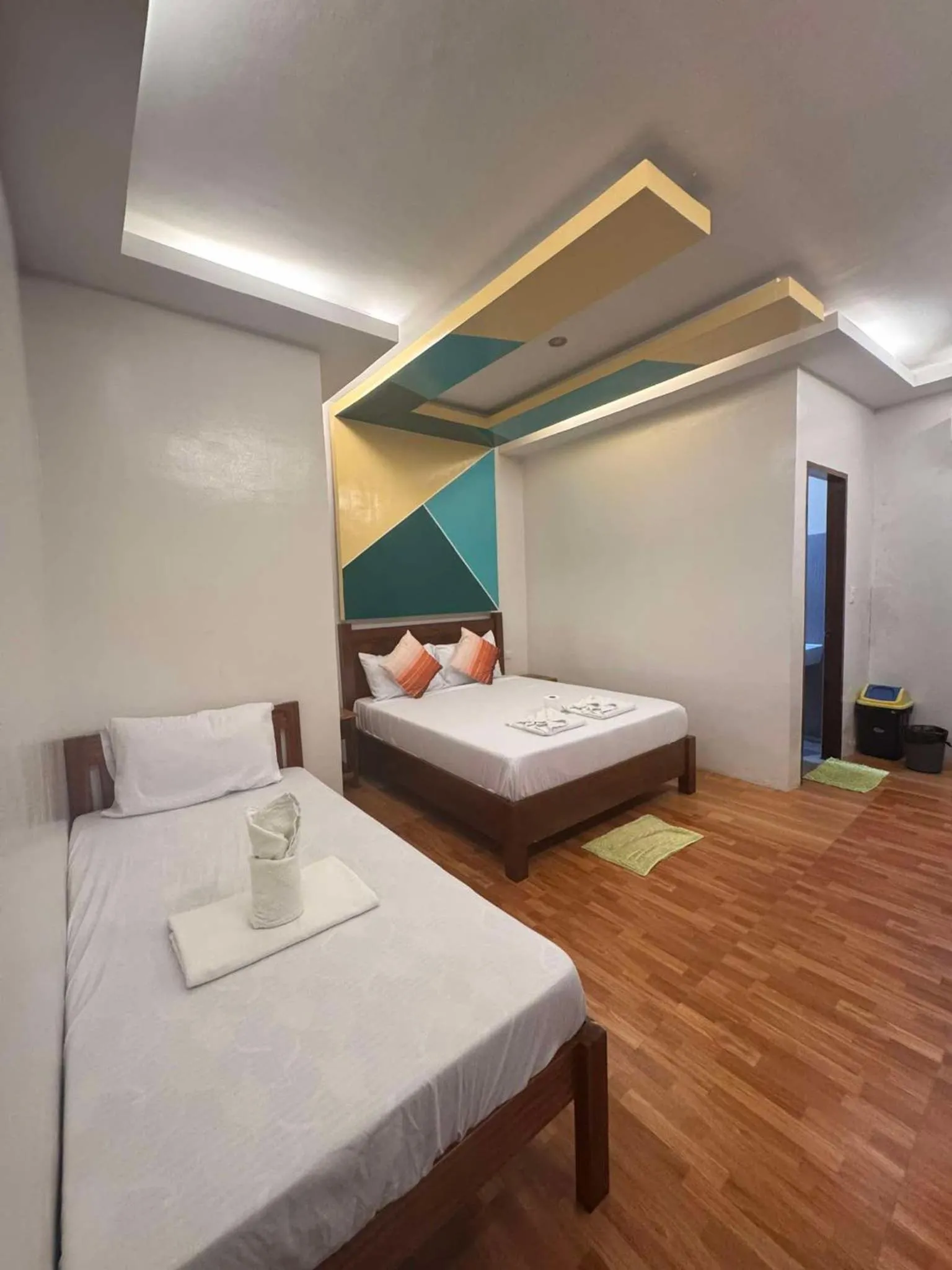Bed in MANANQUIL TRAVEL LODGE
