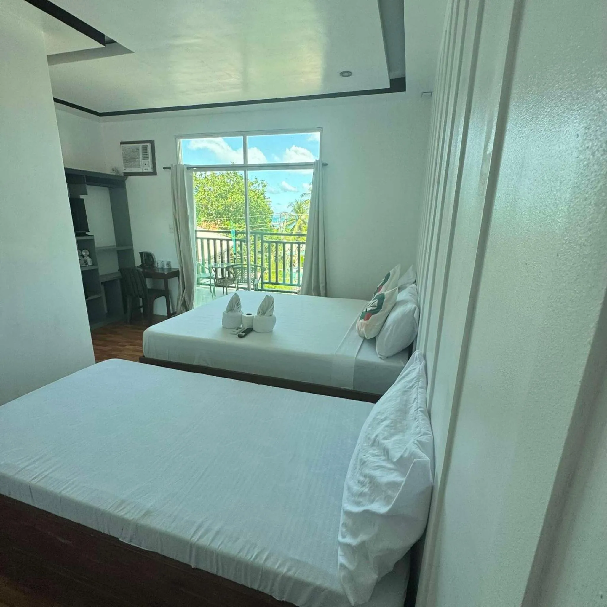 Bed in MANANQUIL TRAVEL LODGE