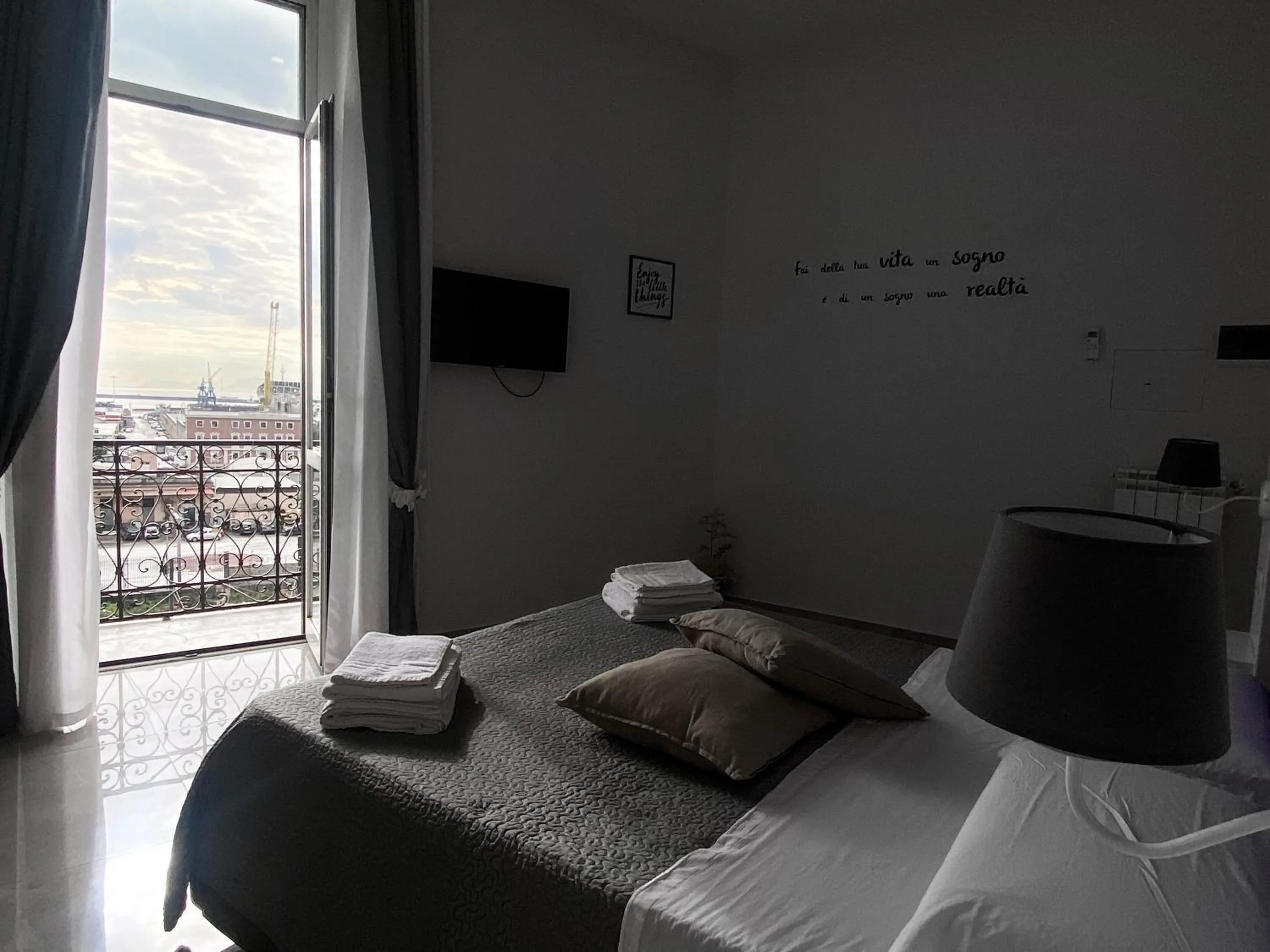 Bed in Aurora Luxury Rooms