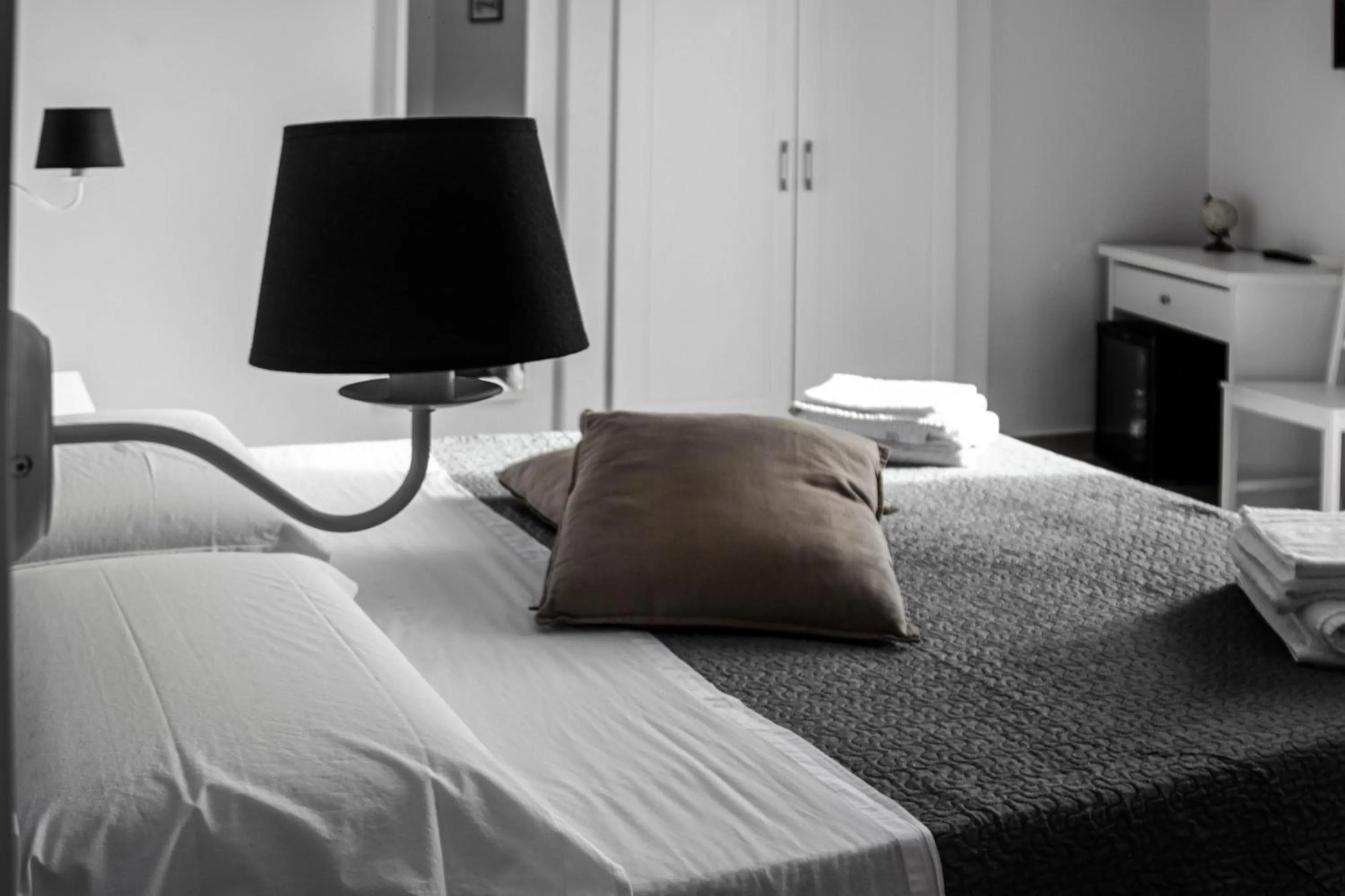 Bed in Aurora Luxury Rooms