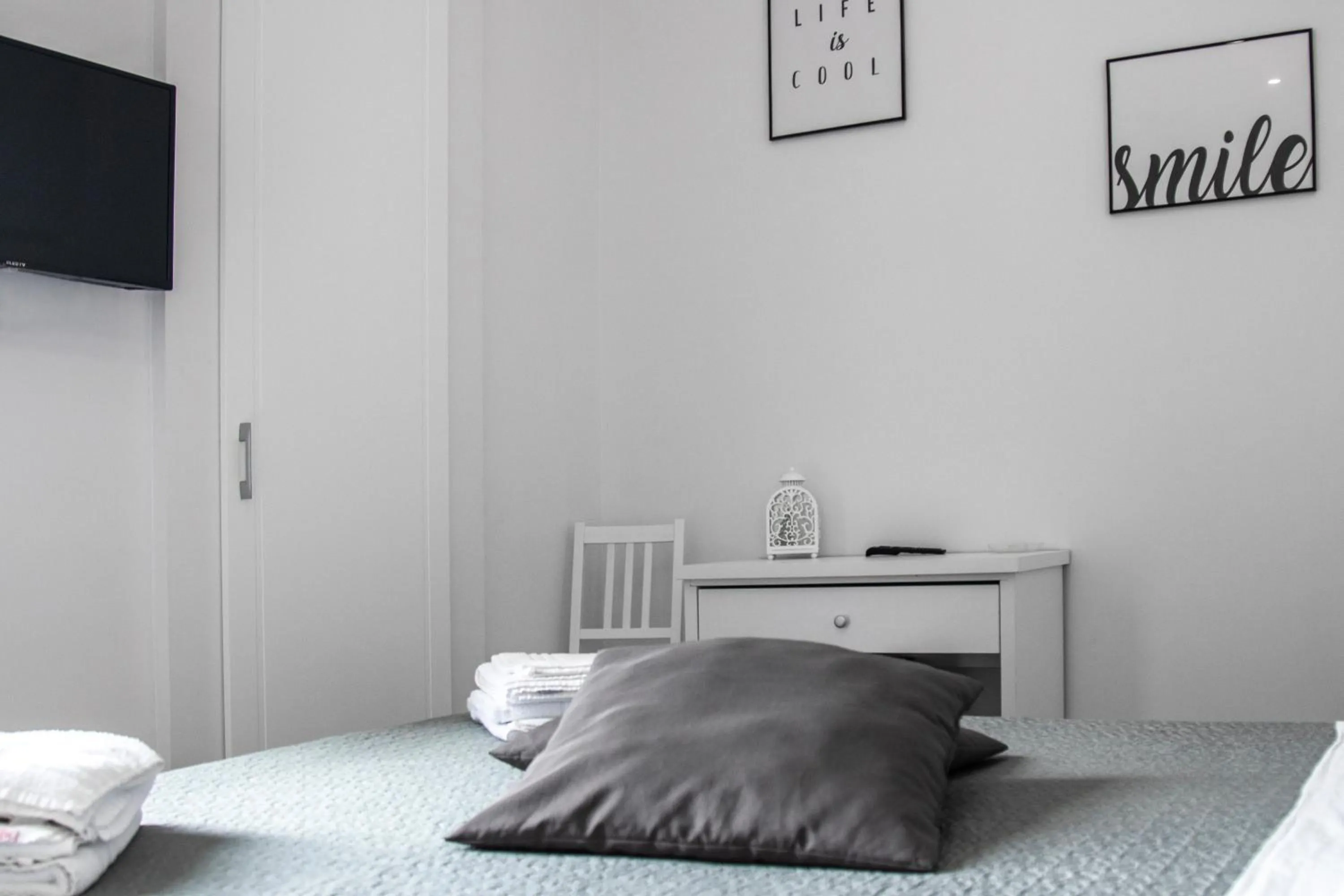 Bed in Aurora Luxury Rooms