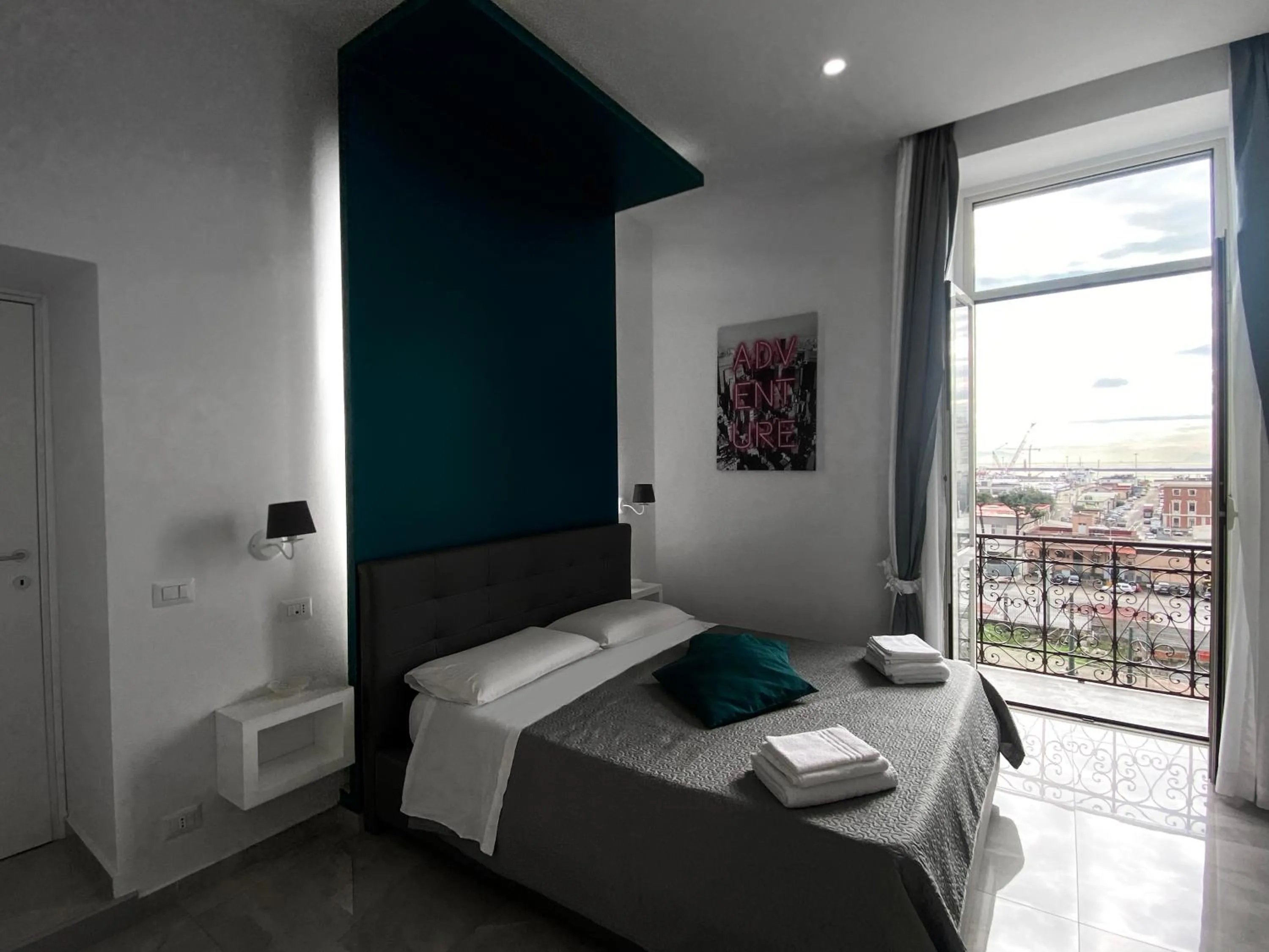 Bed in Aurora Luxury Rooms
