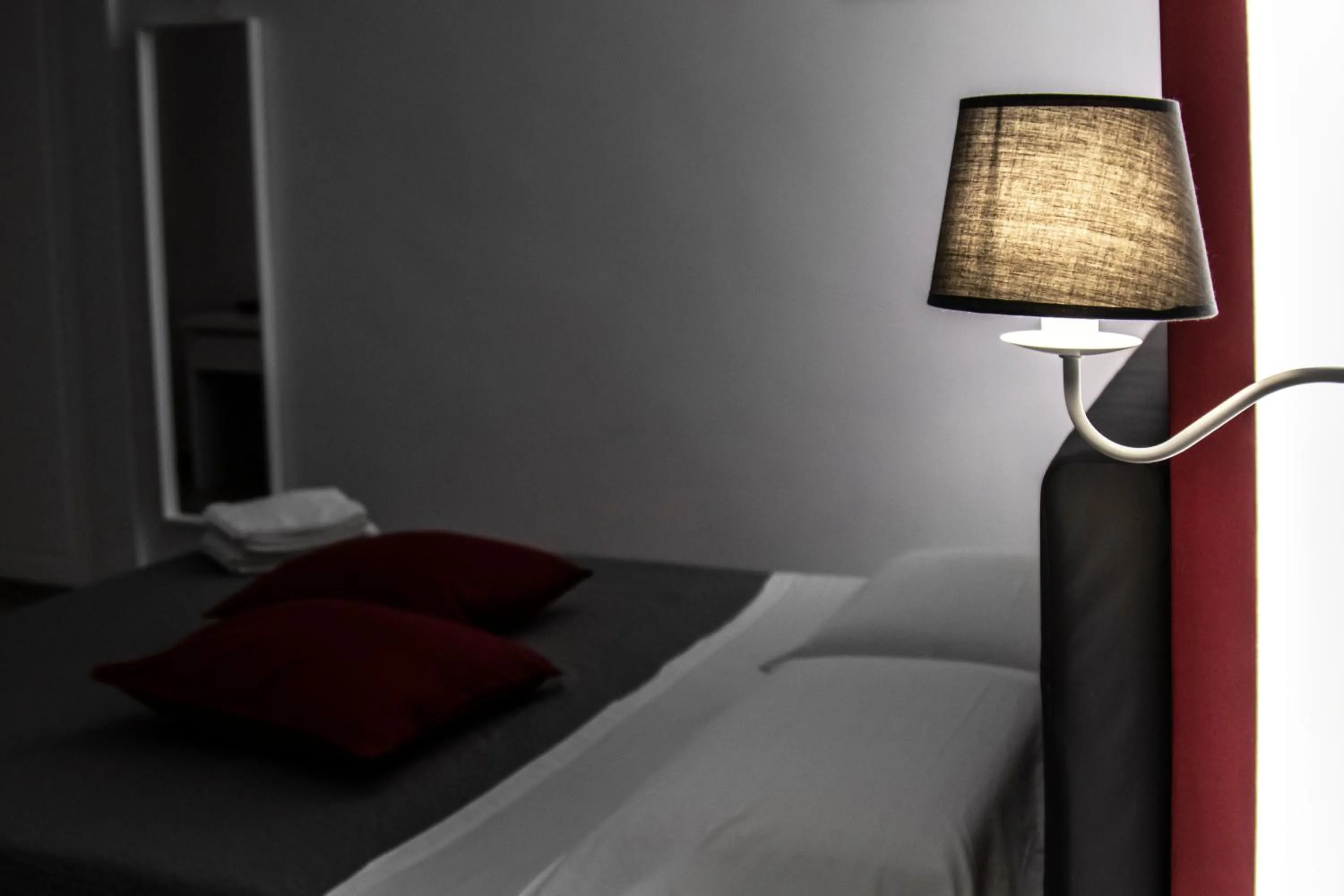 Bed in Aurora Luxury Rooms
